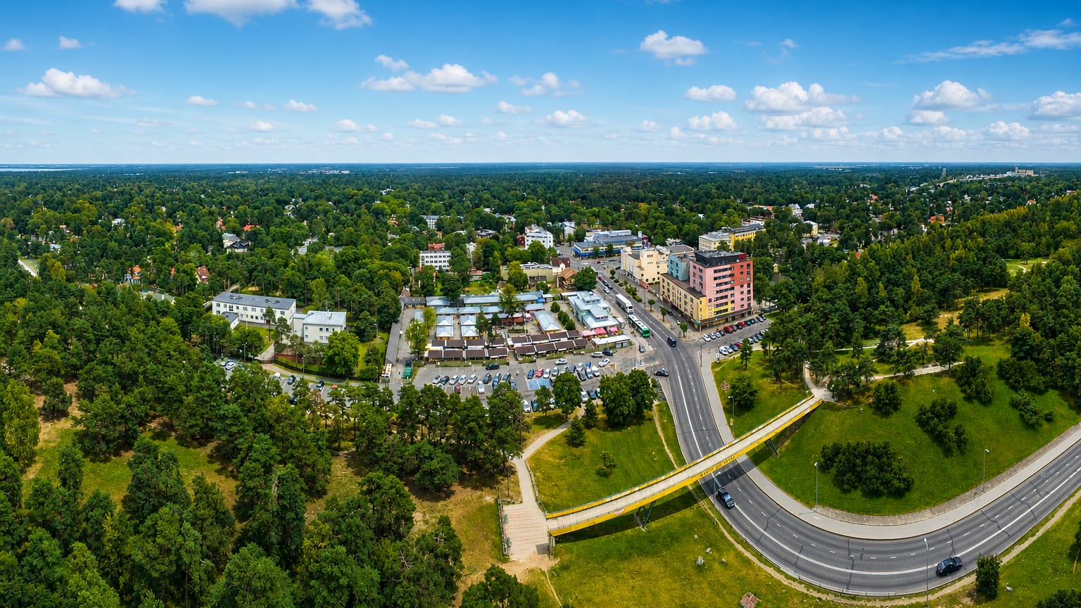 Aerial view of Nõmme's leafy residential district in Tallinn with a small town centre amid pine forest