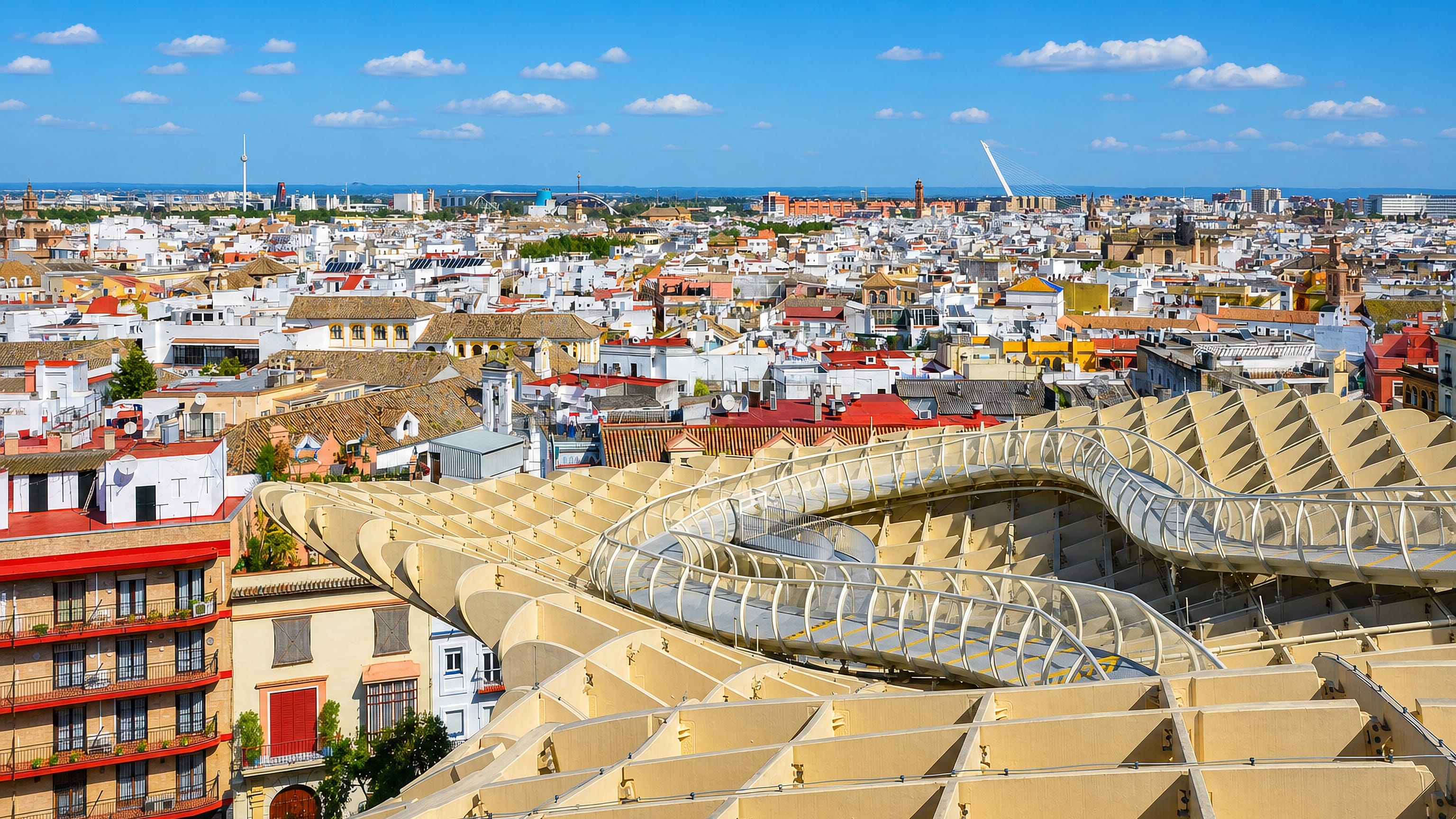 The waffle-like Metropol Parasol rising over tiled rooftops in Seville's Encarnación-Regina quarter.