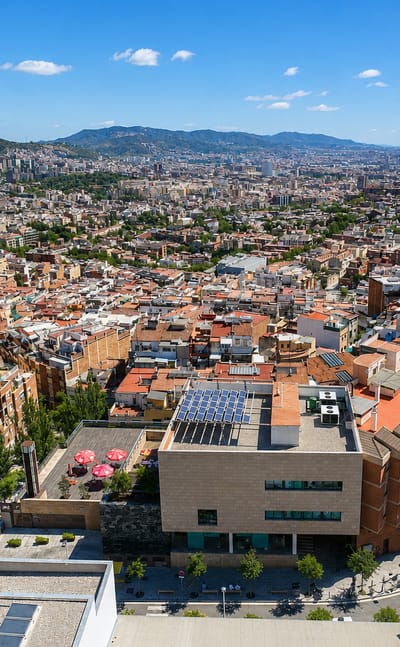Hillside residential streets of El Carmel overlooking Barcelona and the surrounding hills.