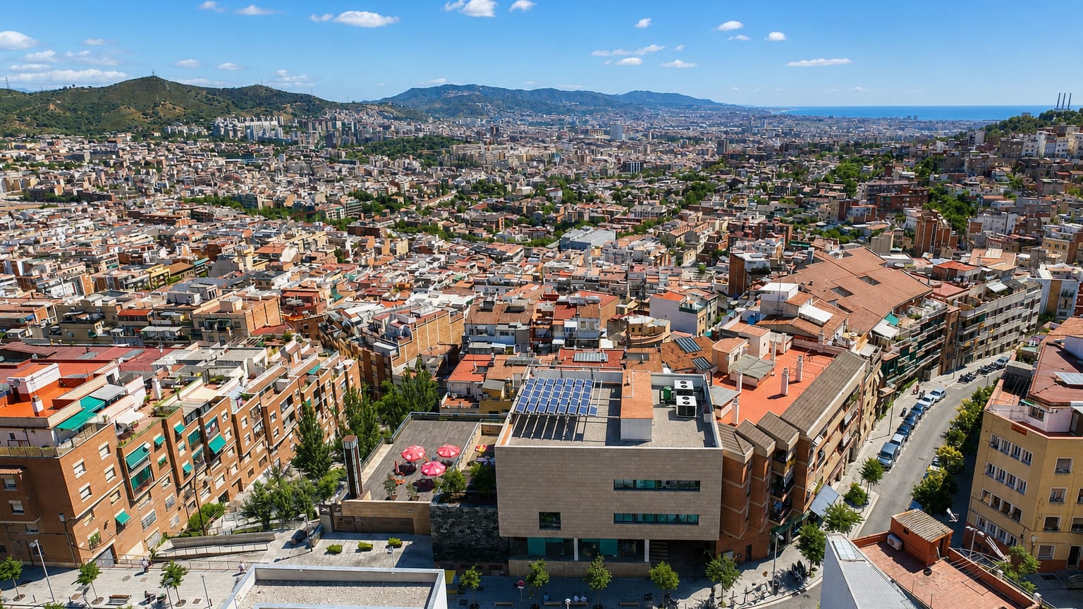 Hillside residential streets of El Carmel overlooking Barcelona and the surrounding hills.
