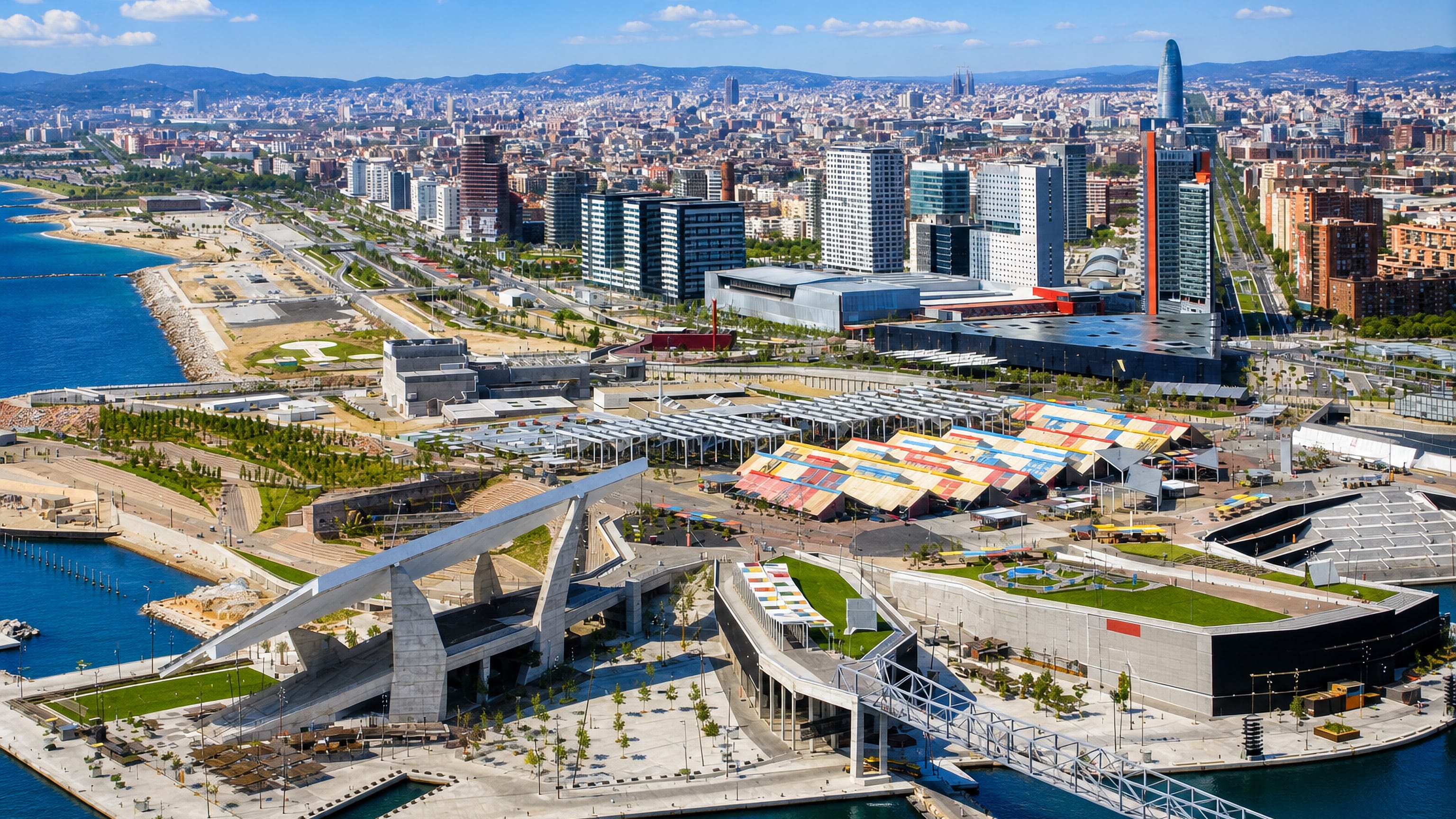 Aerial view of Barcelona's Diagonal Mar and Fòrum waterfront, with Torre Glòries on the skyline.