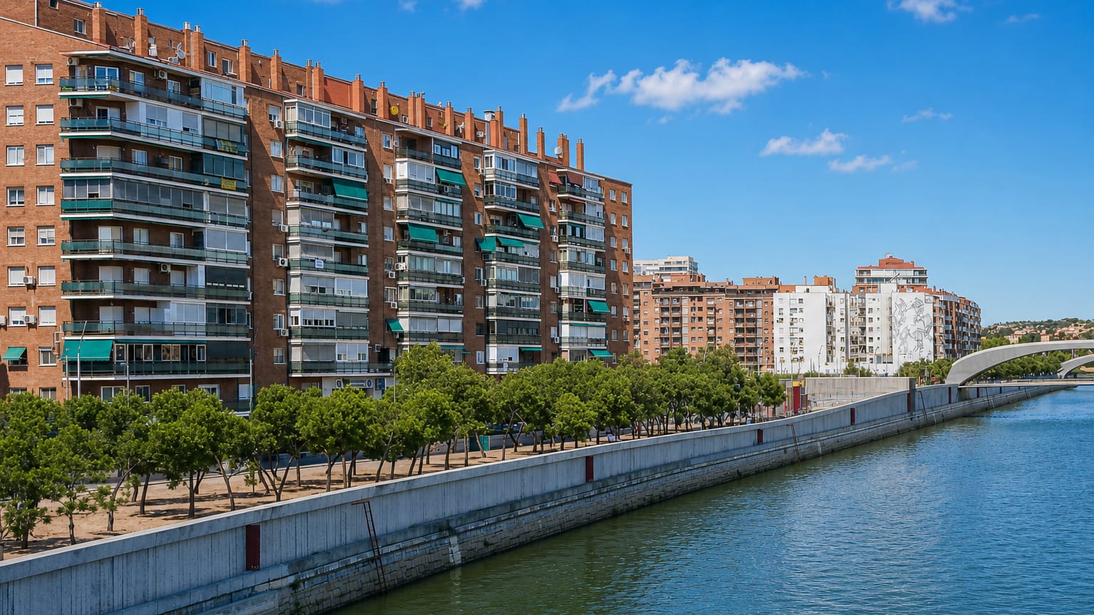 Brick riverside apartment blocks along the Manzanares embankment in Madrid's Moscardó neighbourhood