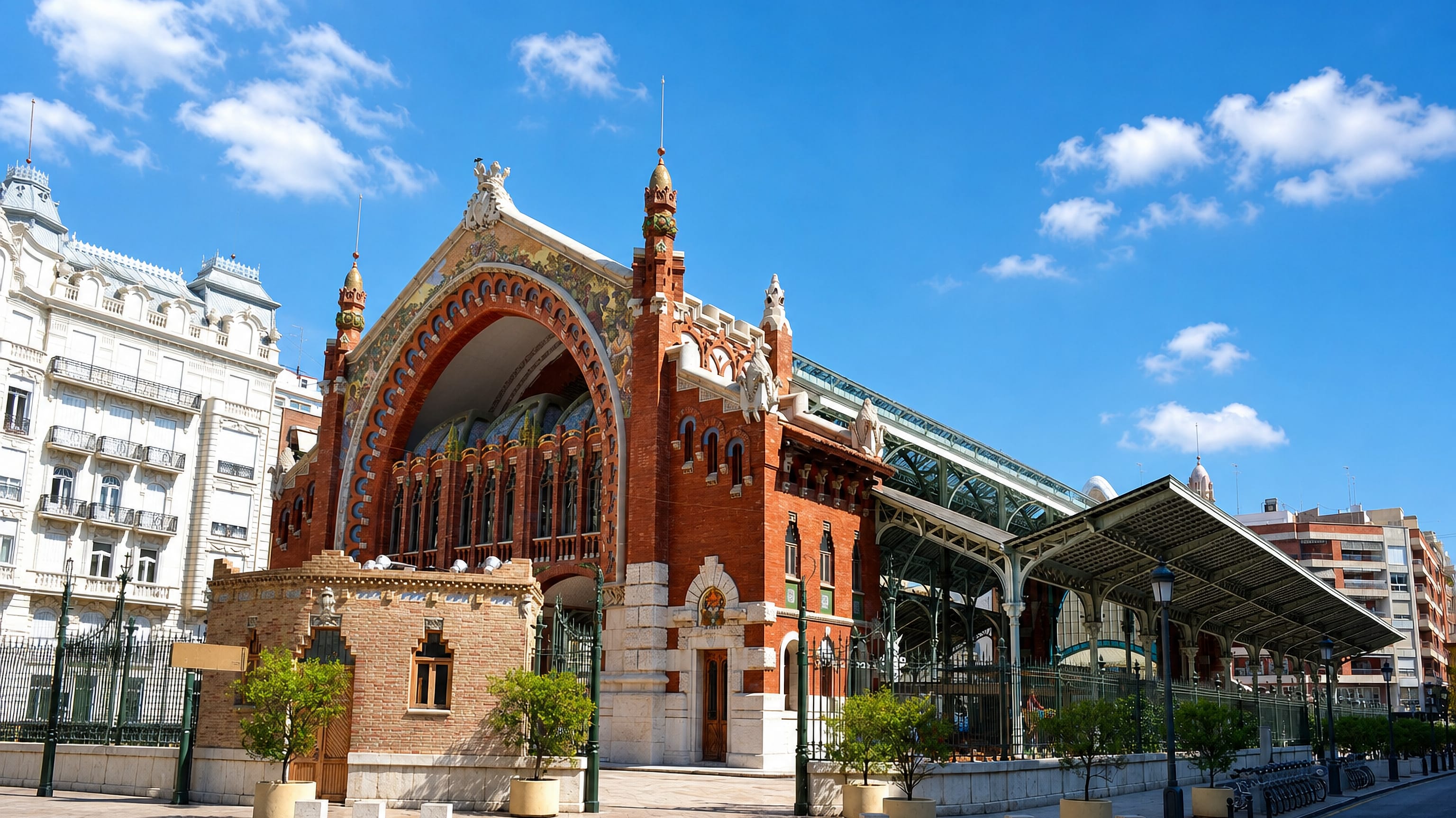 The modernista Mercado de Colon with its brick and iron facade in El Pla del Remei, Valencia, Spain