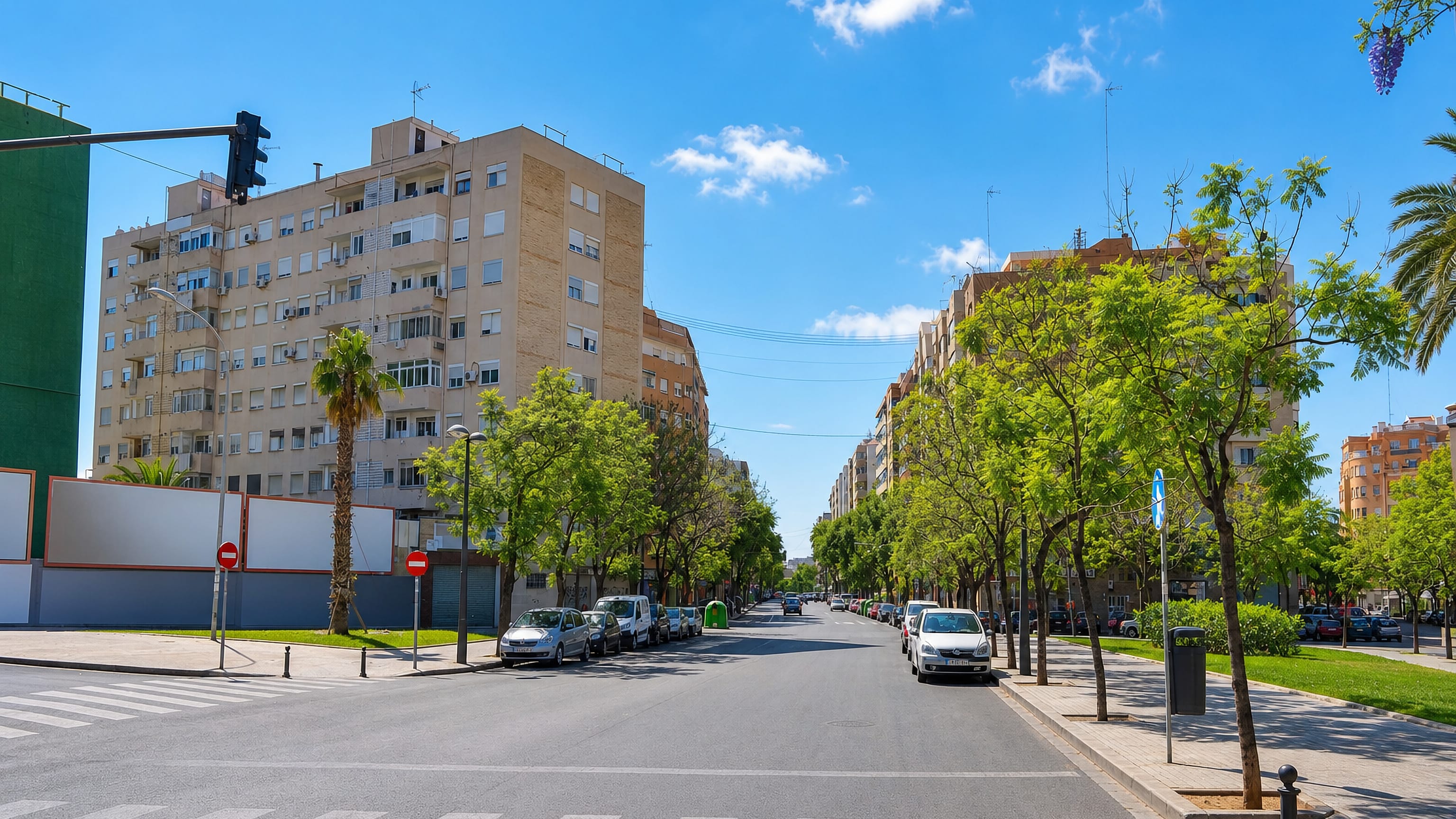 Tree-lined avenue of mid-century apartment blocks in the Marxalenes district of Valencia