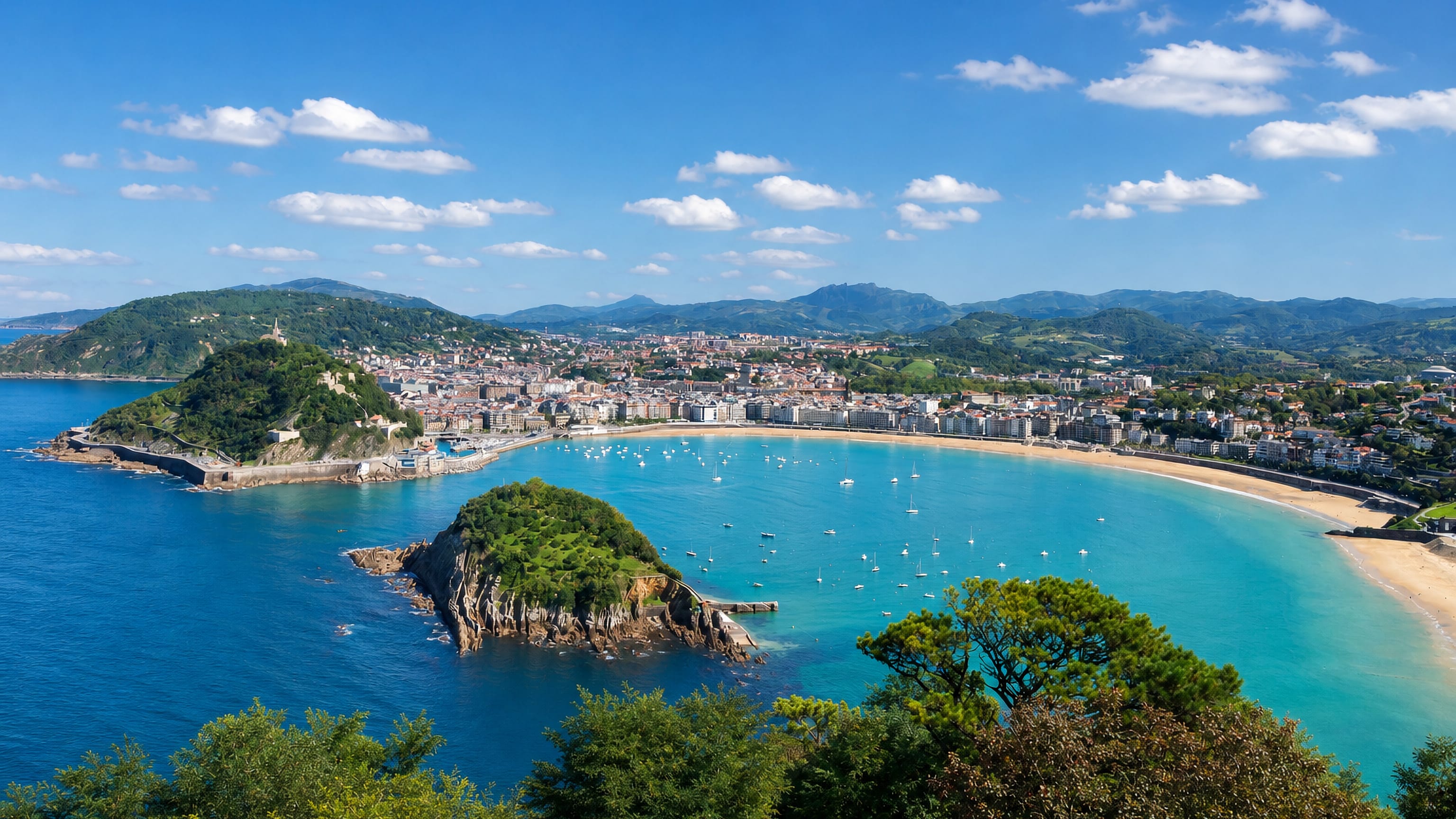 San Sebastián's shell-shaped La Concha bay from Monte Igueldo, with Santa Clara island and Monte Urgull
