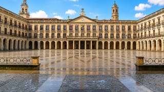Vitoria-Gasteiz's arcaded Plaza de Espana with the neoclassical city hall and San Miguel's bell tower behind.