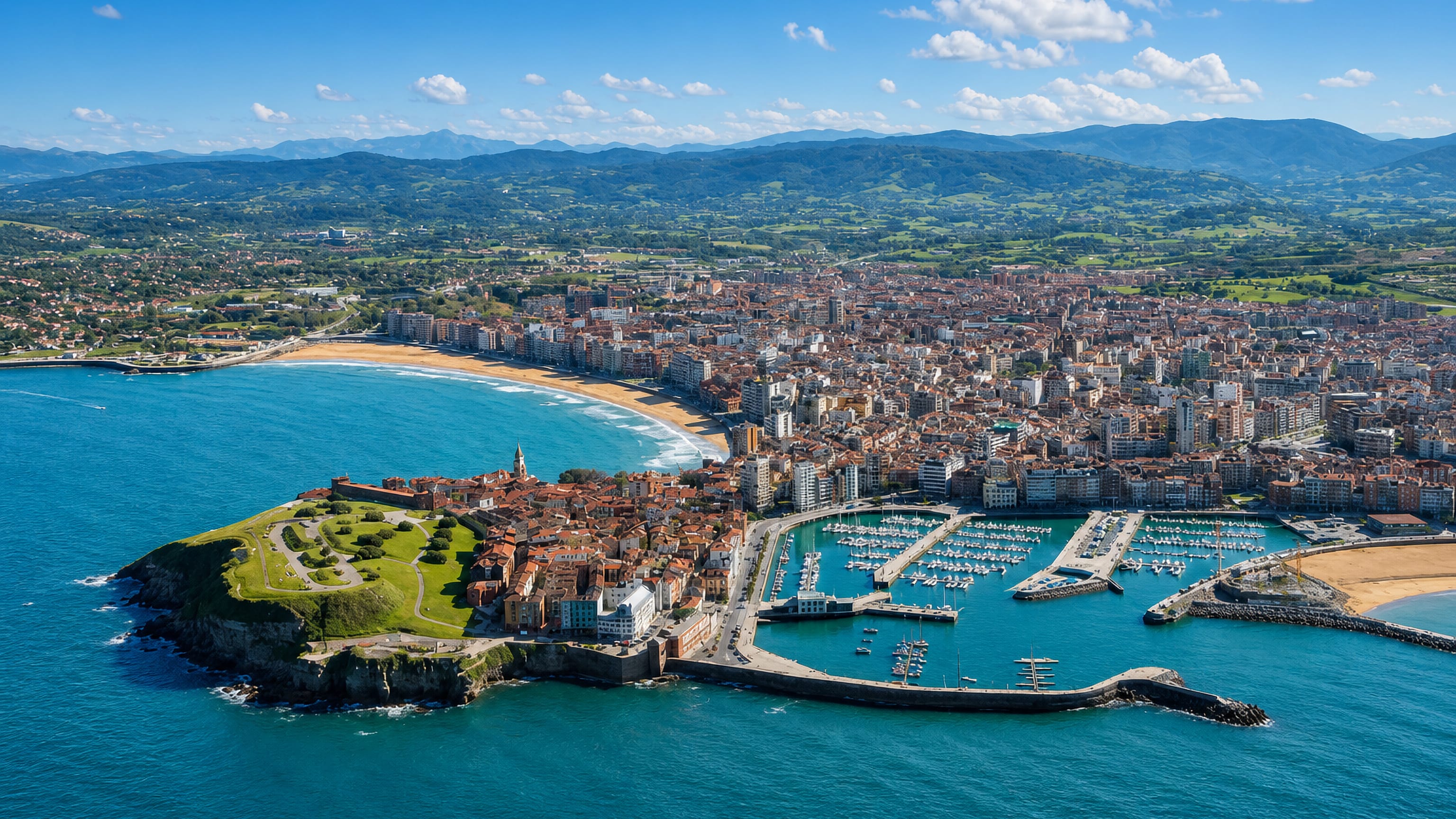 Aerial view of Gijón's Cimadevilla headland between San Lorenzo beach and the marina, Asturias.
