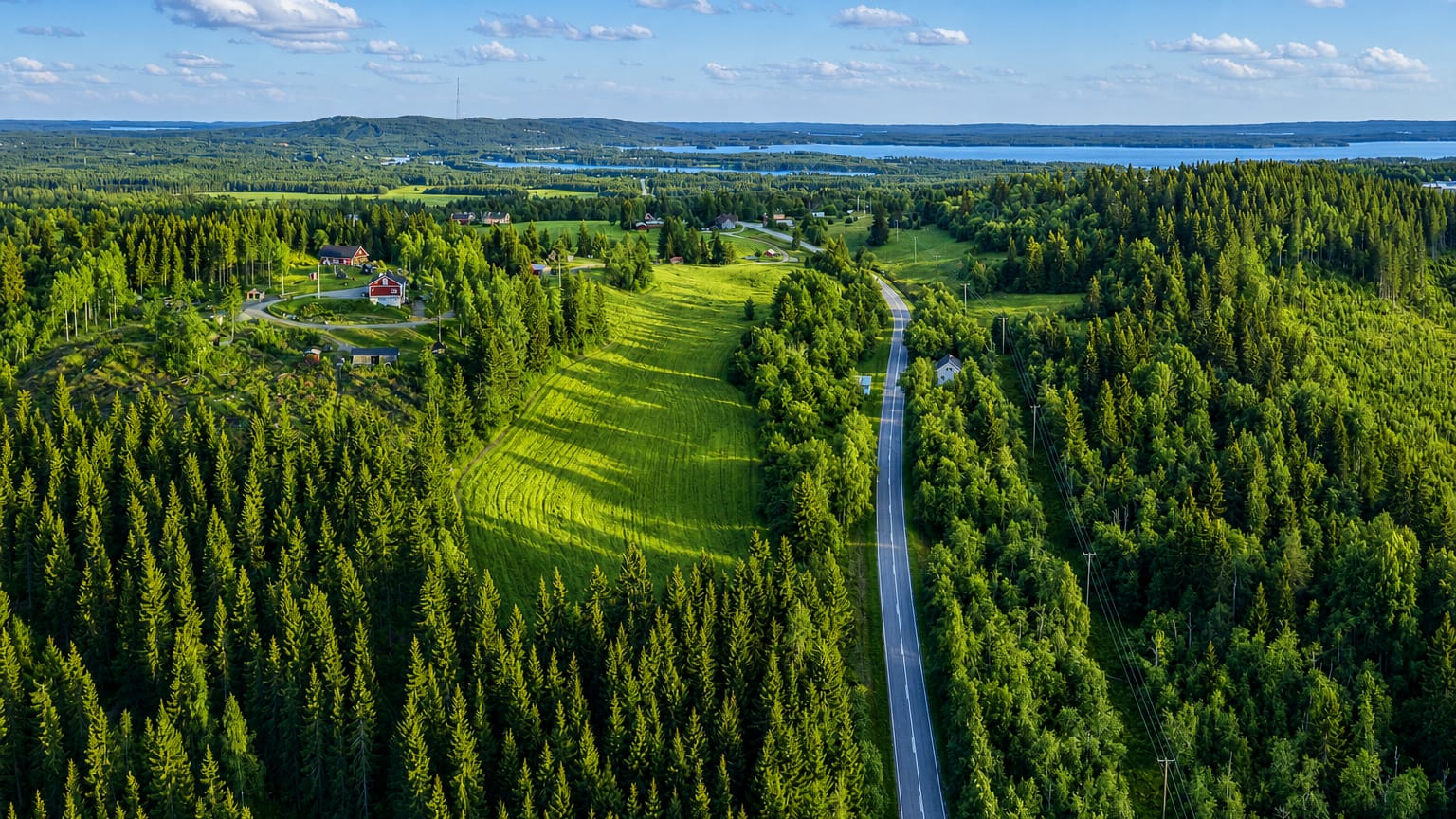 Aerial view of forests, farmland and lakes around Sotkamo in Finland's Kainuu region.