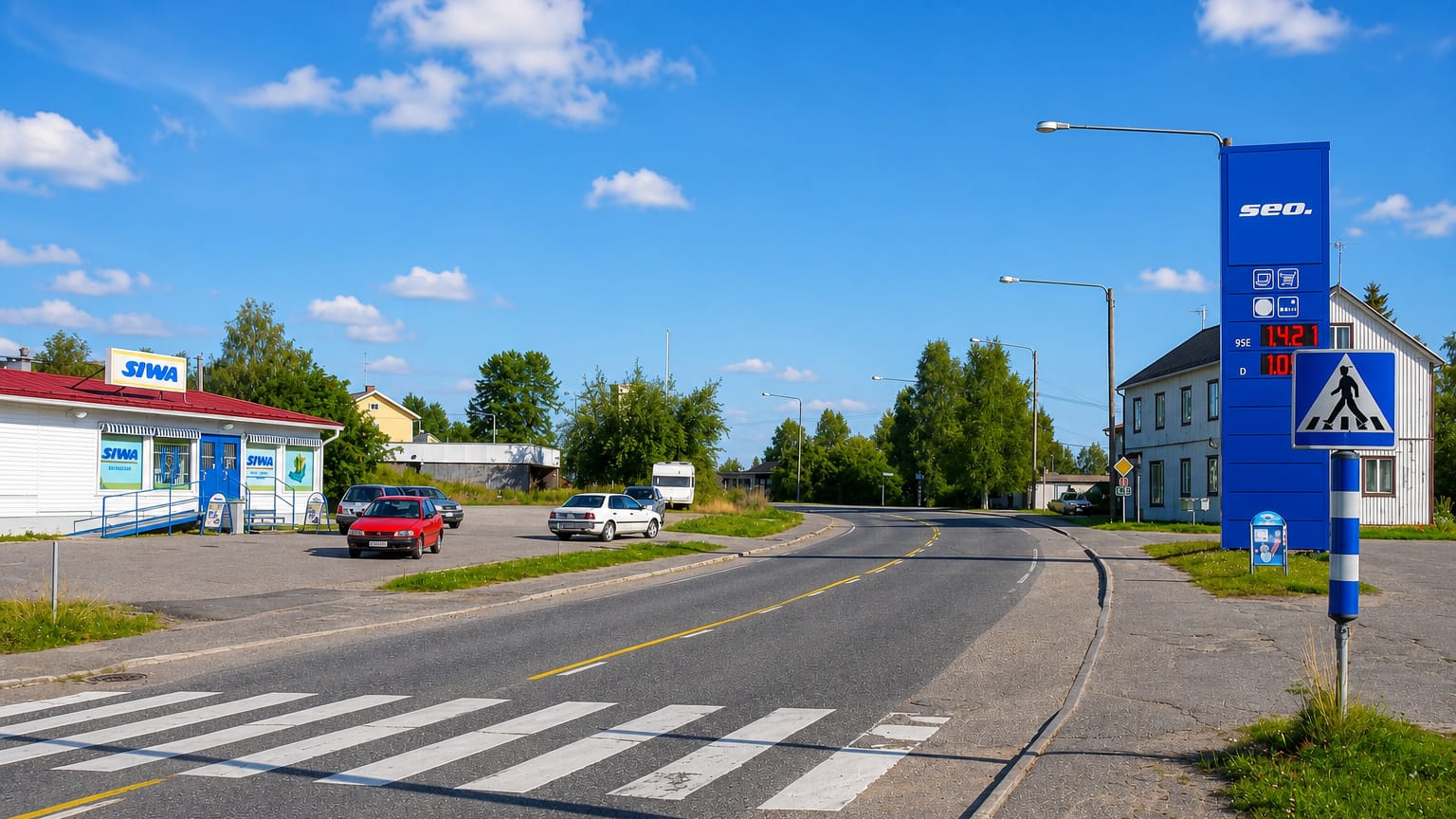 A quiet village street in Pelkosenniemi, Finland, with a small grocery store and roadside petrol station.
