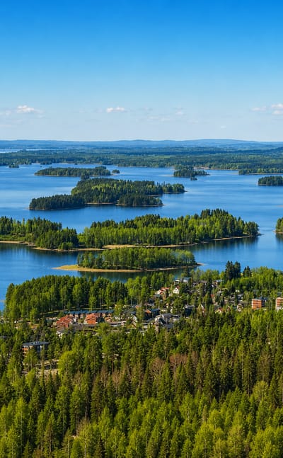 Forested islands on Lake Kallavesi with lakeside houses at Julkula, Kuopio.