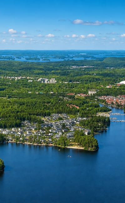 Saaristokaupunki in Kuopio, its modern housing spread across wooded peninsulas among Finland's blue lakes.
