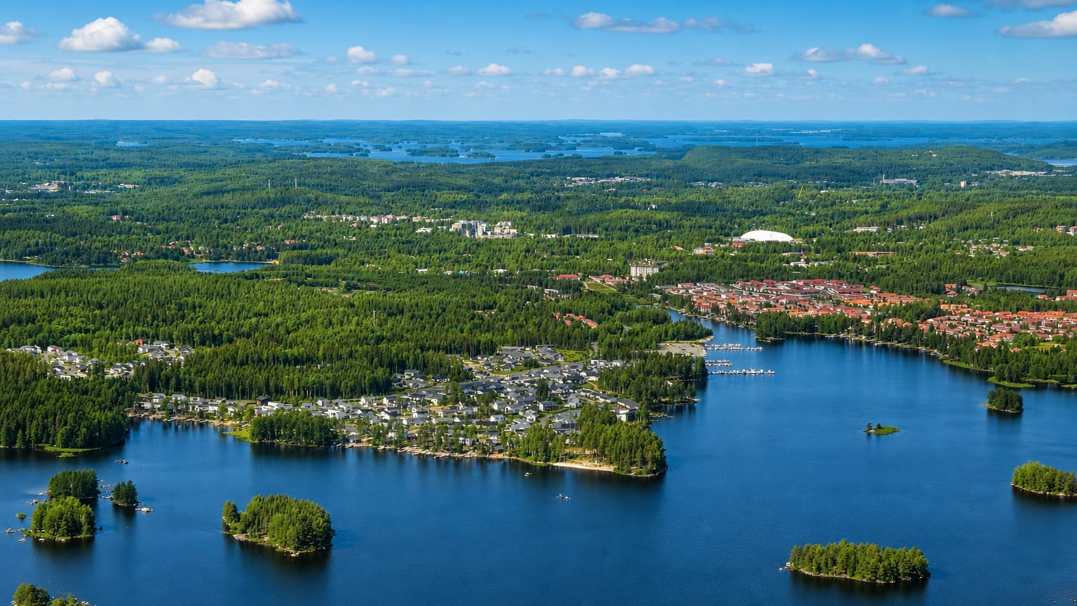 Saaristokaupunki in Kuopio, its modern housing spread across wooded peninsulas among Finland's blue lakes.