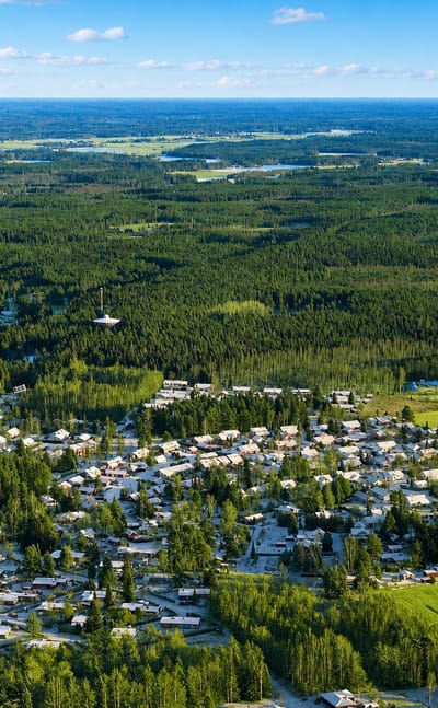 Aerial view of Ulvila, a small town in Finland's Satakunta region surrounded by boreal forest, lakes and green fields