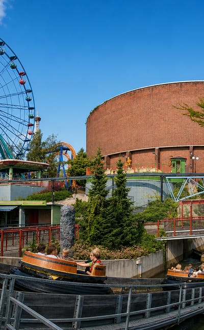 Ferris wheel and brick water tower of the Linnanmäki amusement park in Alppila, Helsinki.