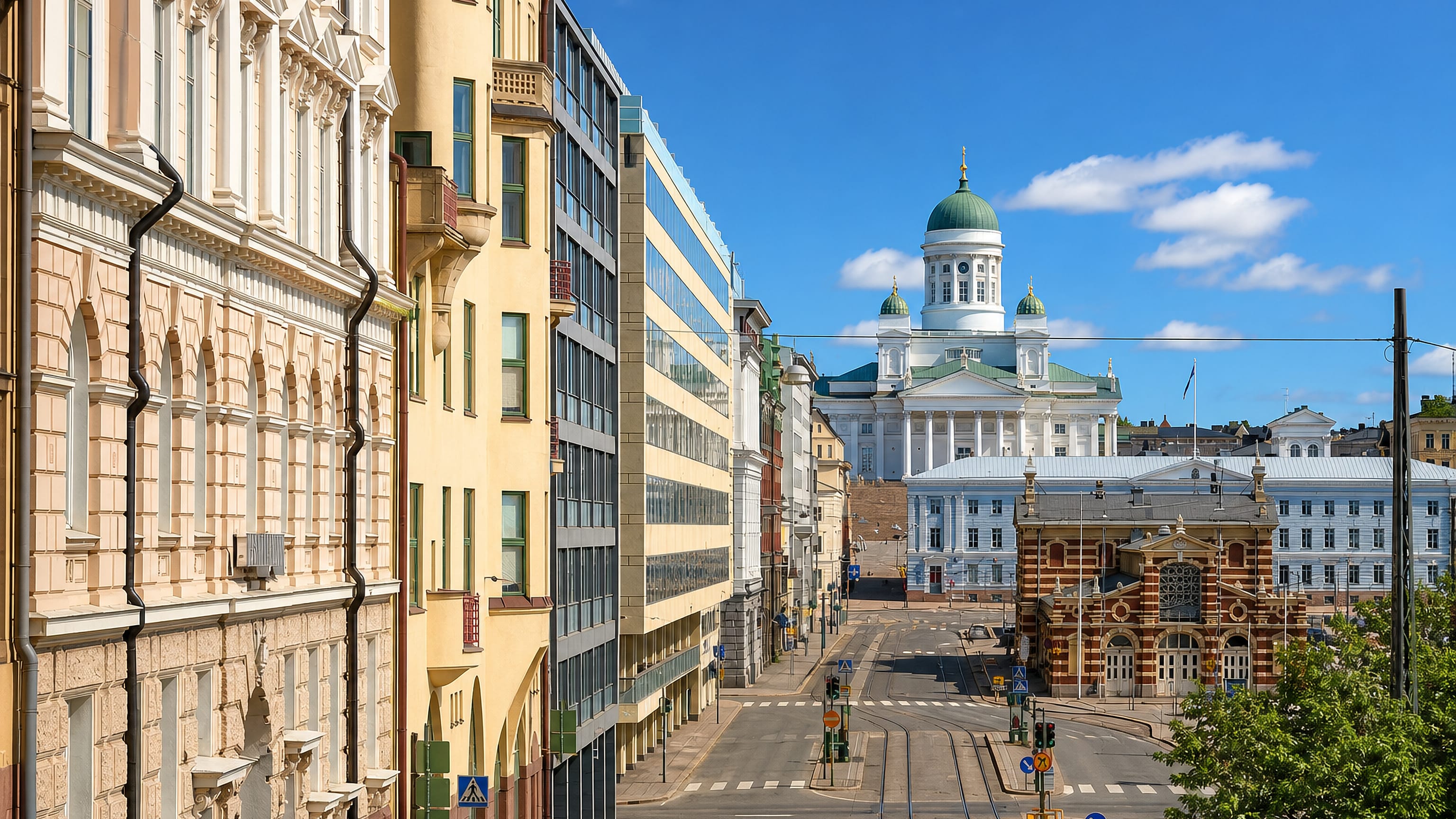 Street view toward Helsinki Cathedral and the red-brick Old Market Hall from Kaartinkaupunki, Helsinki.