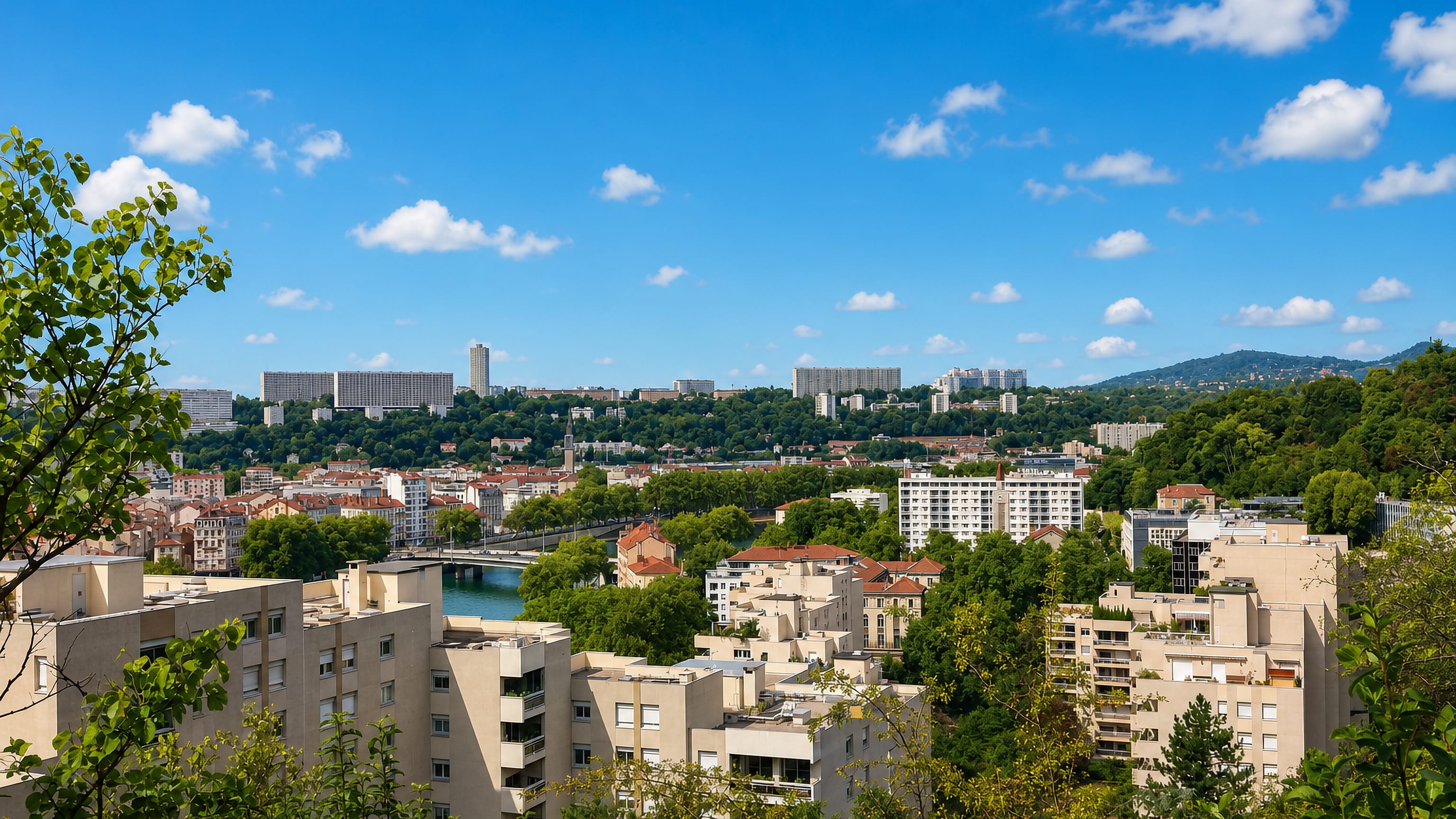 La Duchère's modern apartment blocks on the Lyon hillside above the Saône and its bridges.