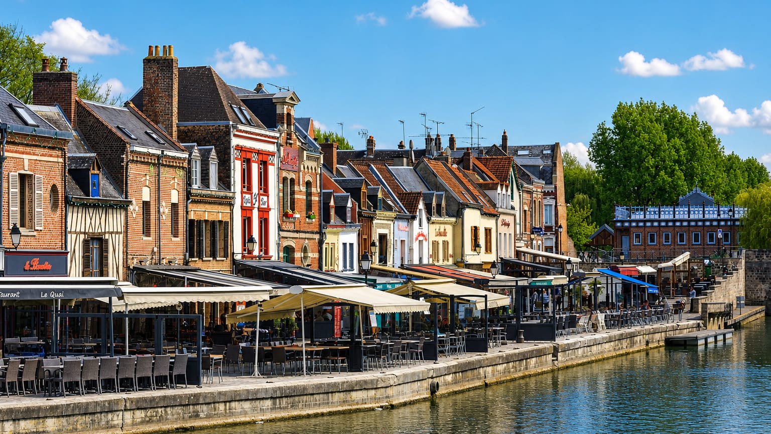 Colourful canalside houses and quayside restaurants along the Somme in the Saint-Leu quarter of Amiens.