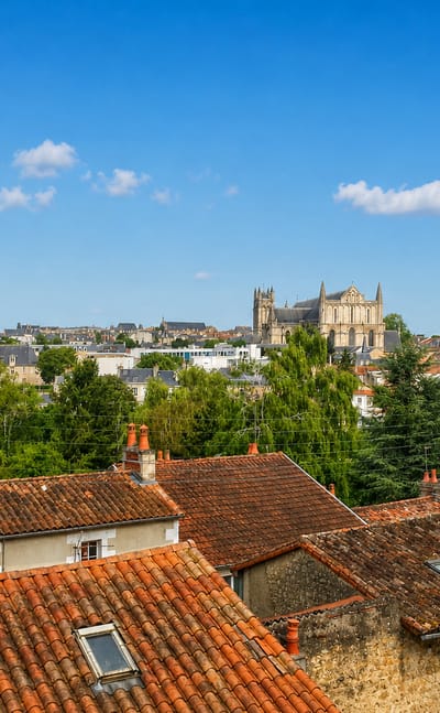 Poitiers old town of terracotta rooftops and Gothic churches including the cathedral, France.
