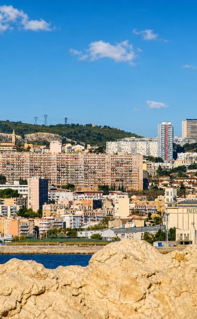 Harbourside view of La Cabucelle, northern Marseille, with the Panzani pasta factory and hillside housing.
