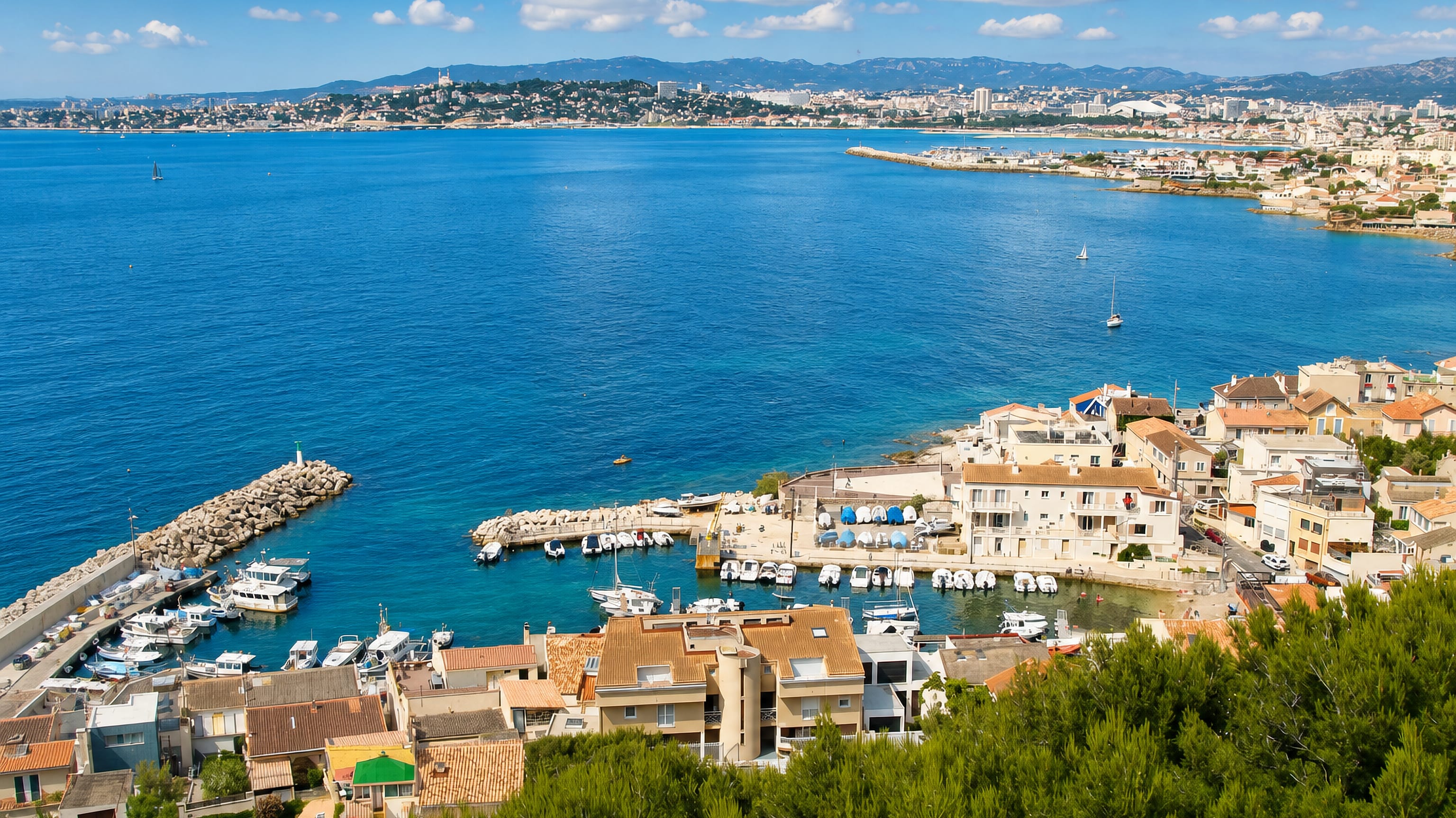 The small harbour and hillside houses of Montredon overlooking the bay of Marseille.