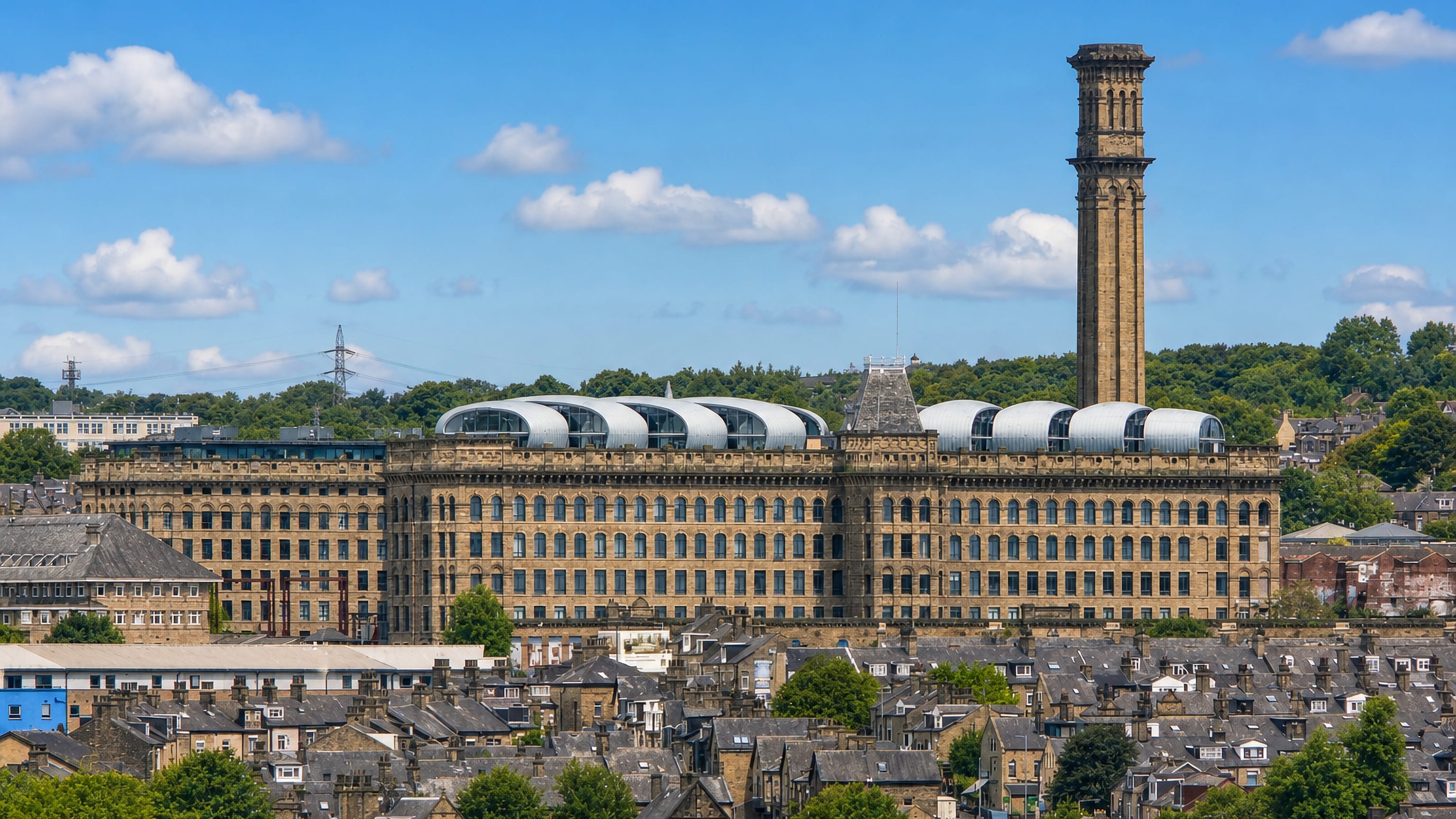 Lister Mills' Italianate chimney rising over the stone terraced streets of Manningham, Bradford