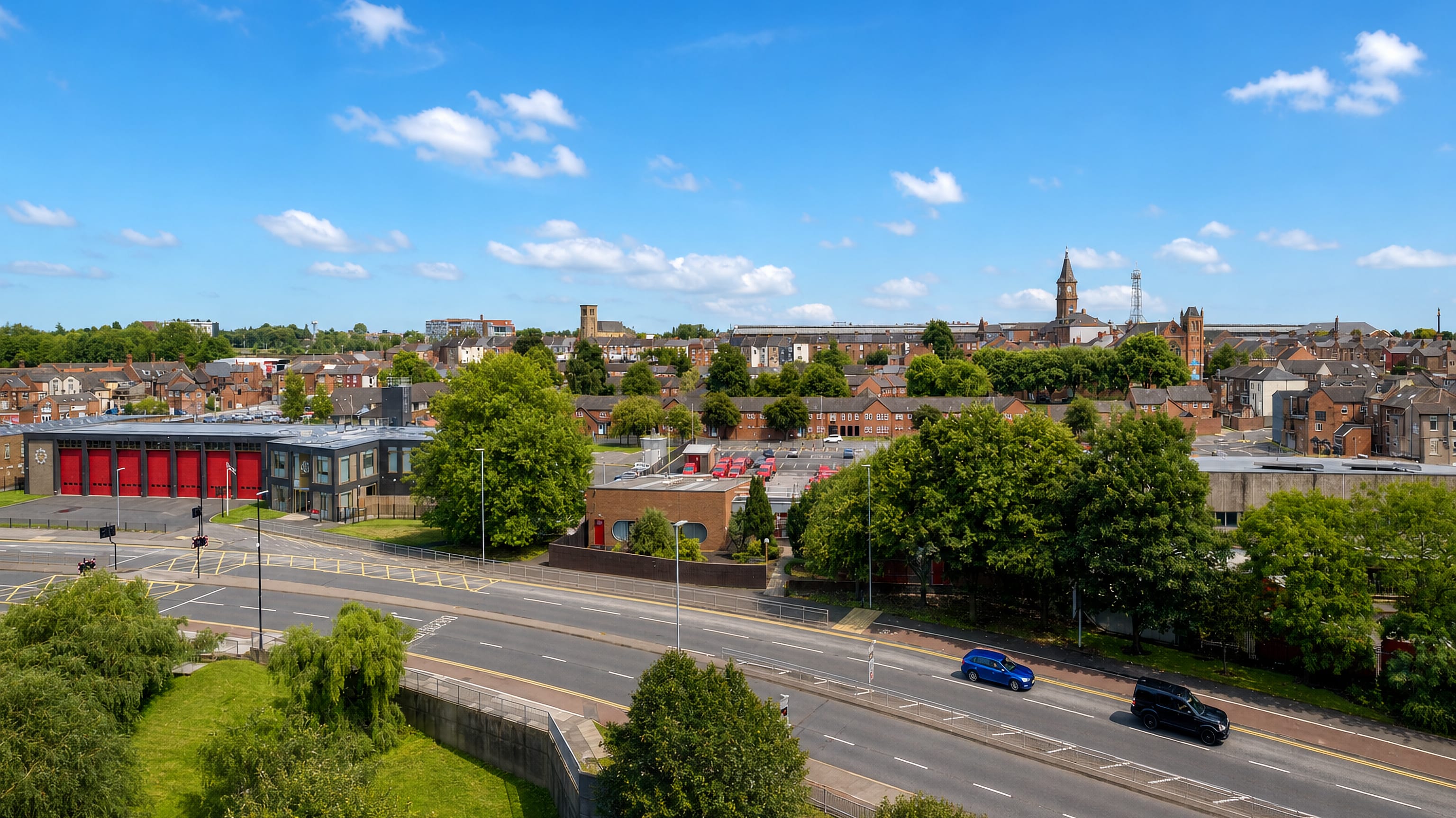 Rooftops, church towers and the ring road across Darlington, County Durham, England.