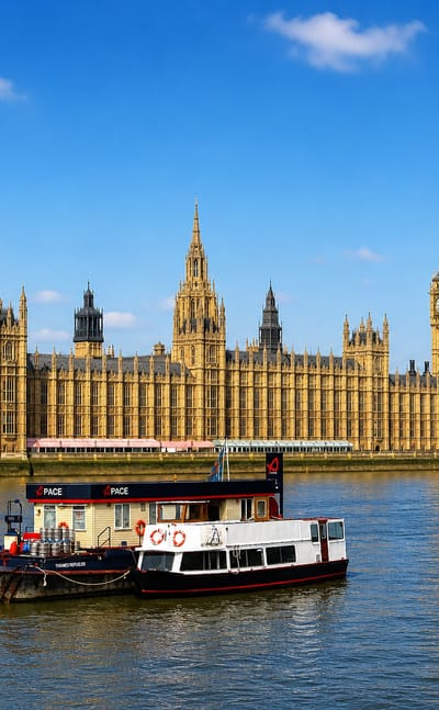 The Palace of Westminster and Elizabeth Tower rise beside the River Thames in the City of Westminster.