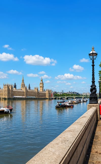 The Albert Embankment in Lambeth looking across the Thames to the Palace of Westminster and Big Ben, London