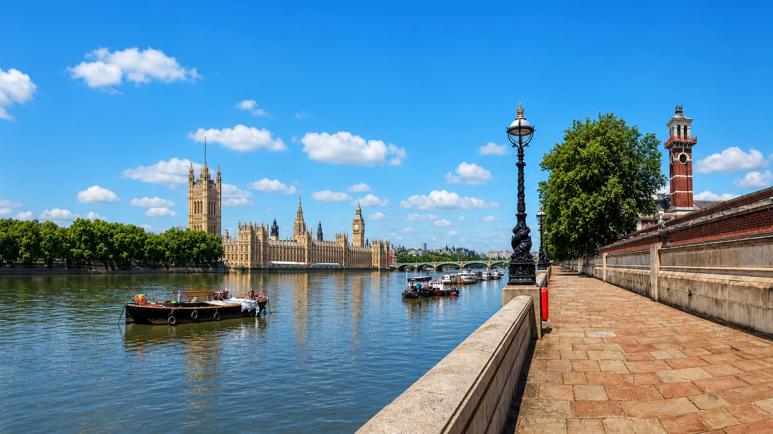 The Albert Embankment in Lambeth looking across the Thames to the Palace of Westminster and Big Ben, London