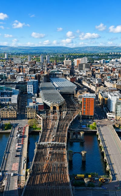 Aerial view of Glasgow with railway bridges crossing the River Clyde into the city centre