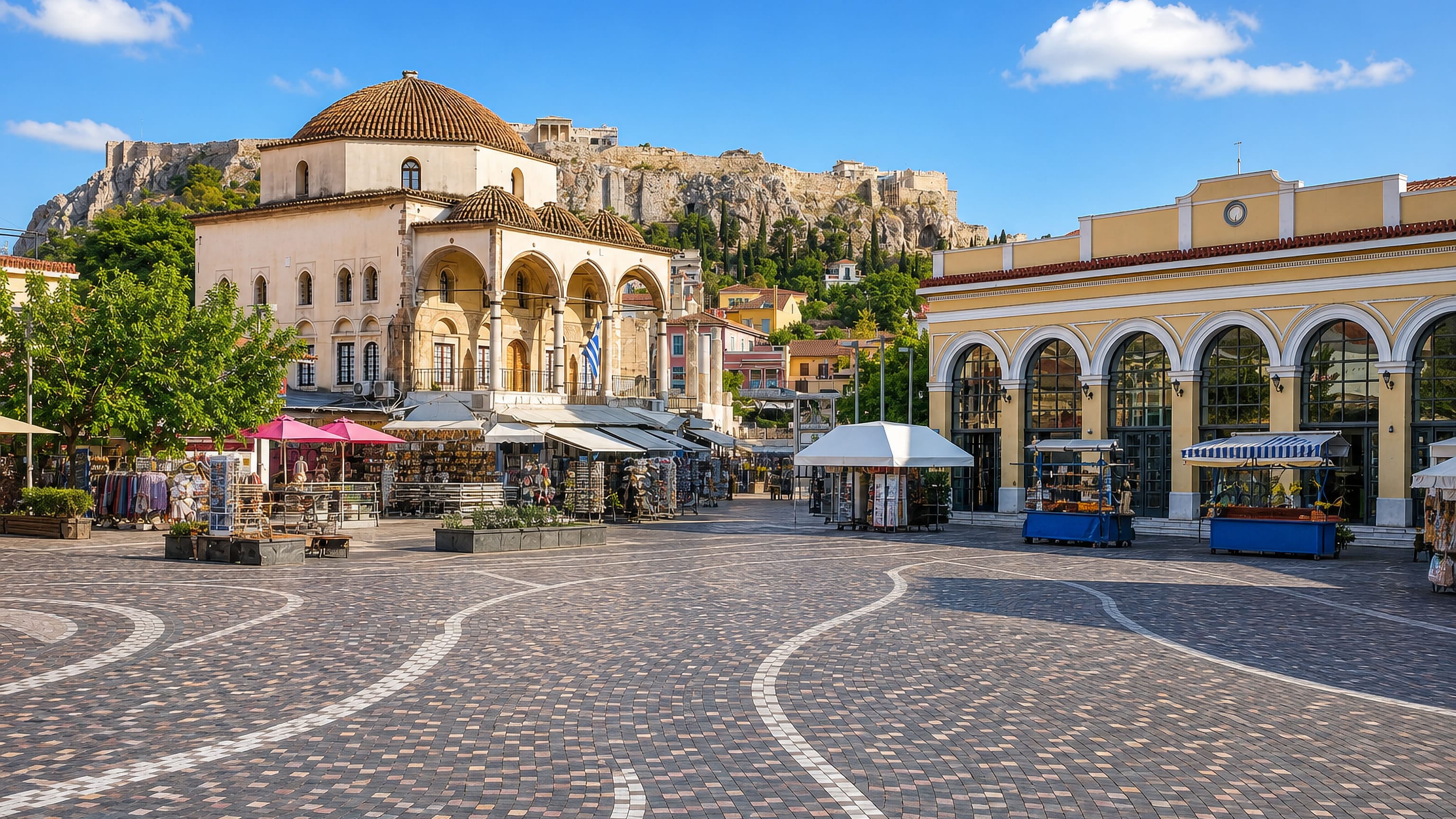 Monastiraki Square in Athens with the Tzistarakis Mosque, market stalls and the Acropolis behind