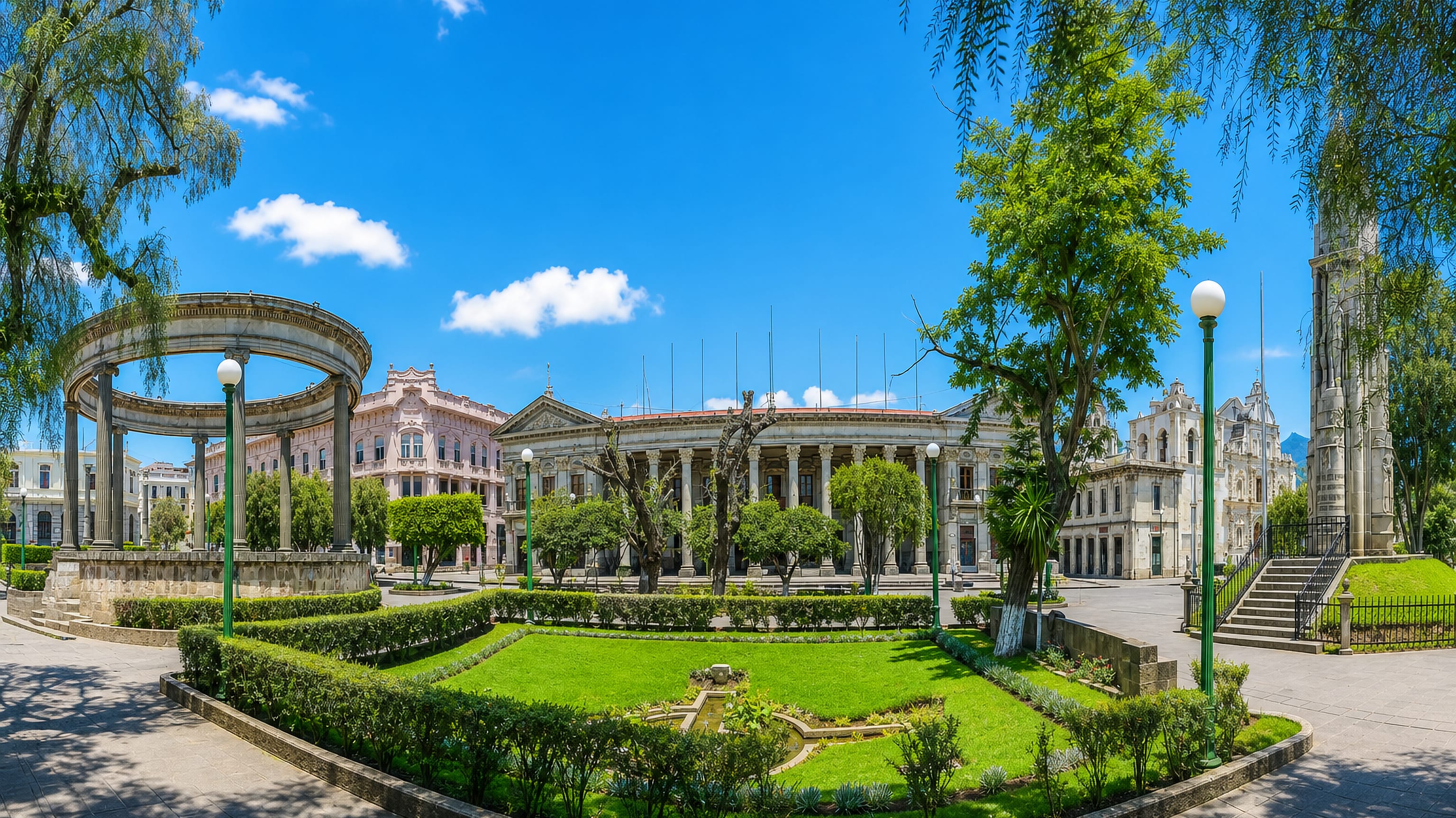 Parque Centro América in Quetzaltenango with its neoclassical colonnade, stone rotunda and pastel facades.
