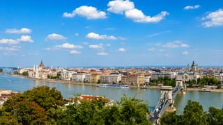 The Hungarian Parliament, Chain Bridge and St. Stephen's Basilica along the Danube in Budapest, viewed from Buda Castle hill.