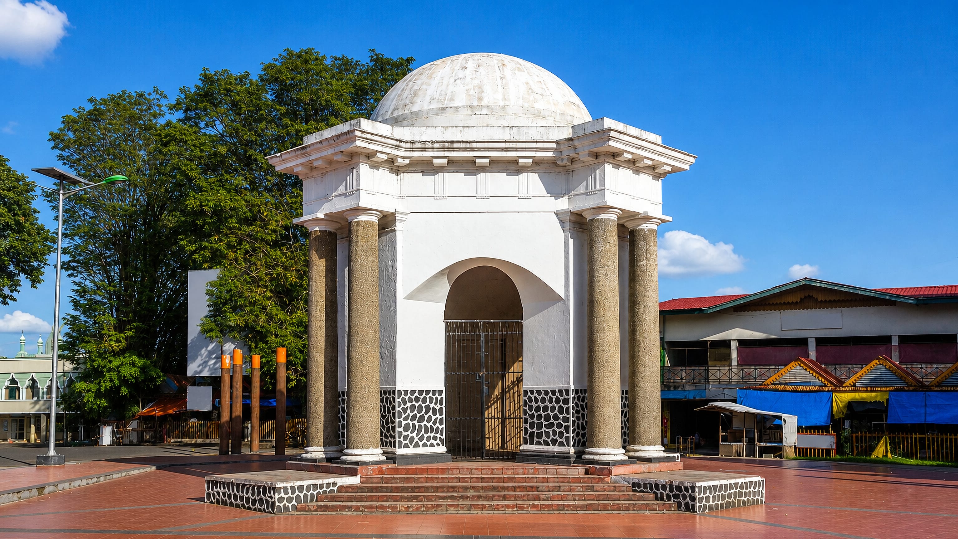 White domed colonial monument beside the market in central Bengkulu, Sumatra, Indonesia