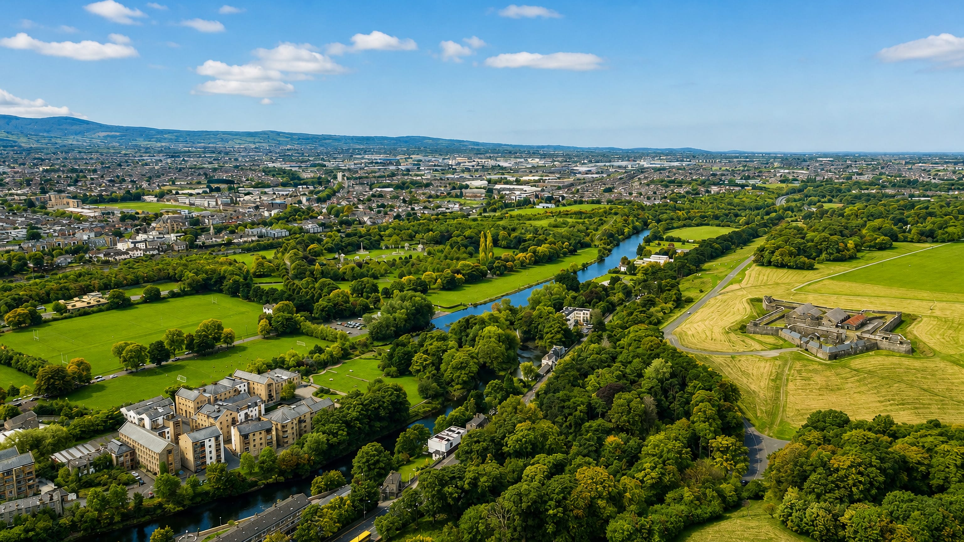 Aerial view of the River Liffey at Islandbridge, Dublin, with parkland, the Magazine Fort and the city beyond.