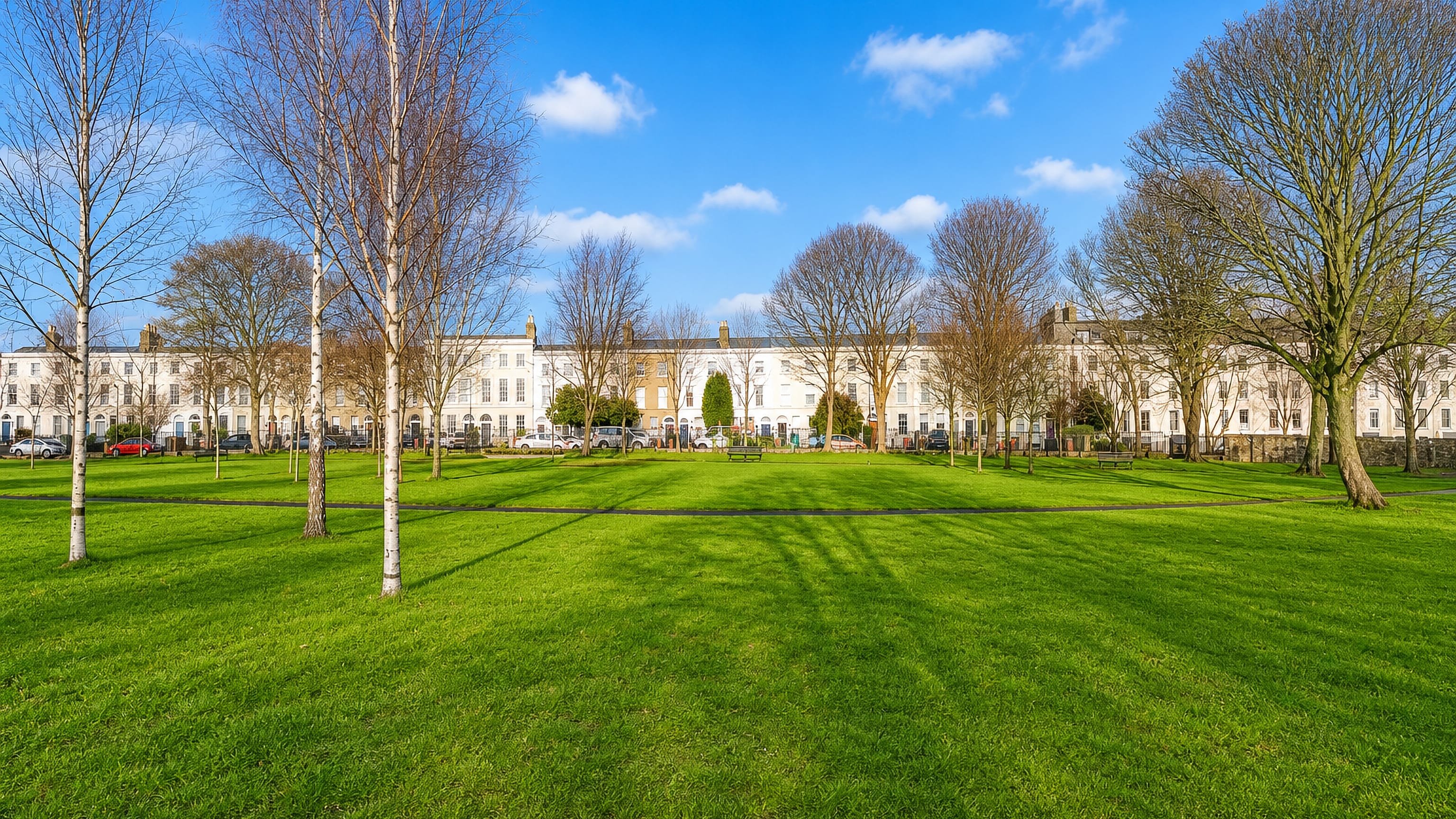 Georgian terraced houses curving around the green at Marino Crescent in Marino, Dublin.