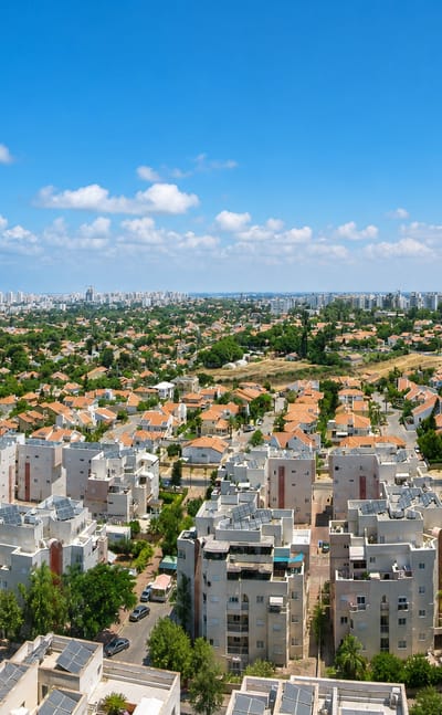Aerial view of Ashkelon's residential districts and villas reaching toward the Mediterranean coast.
