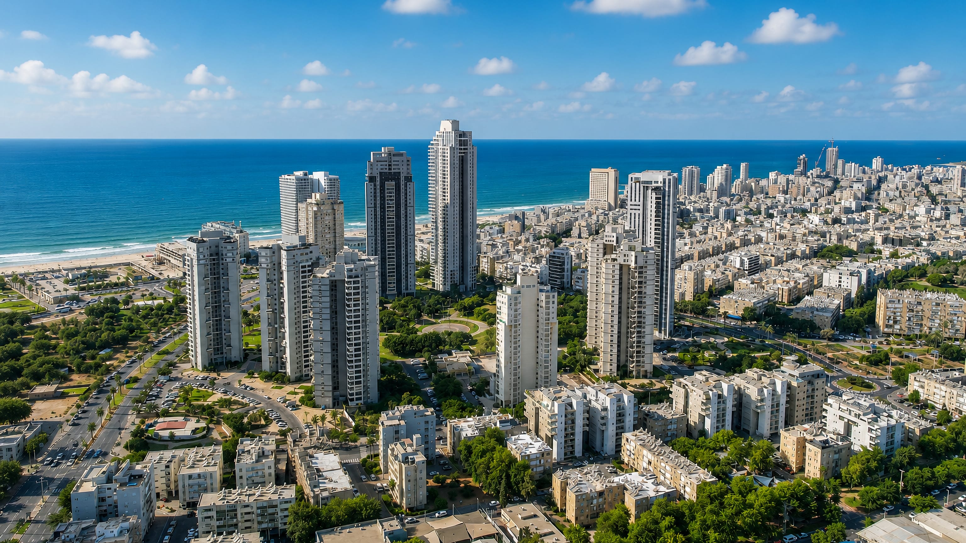 Aerial view of Bat Yam's beachfront apartment towers and Mediterranean shoreline south of Tel Aviv