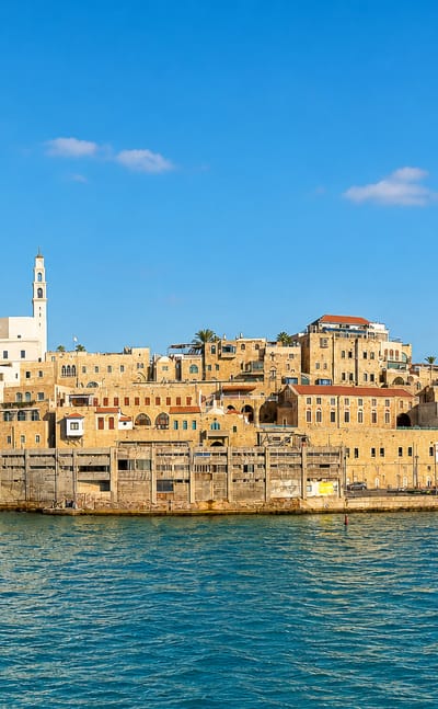Old Jaffa's stone Old City and St. Peter's Church rising above the Mediterranean waterfront in Tel Aviv.