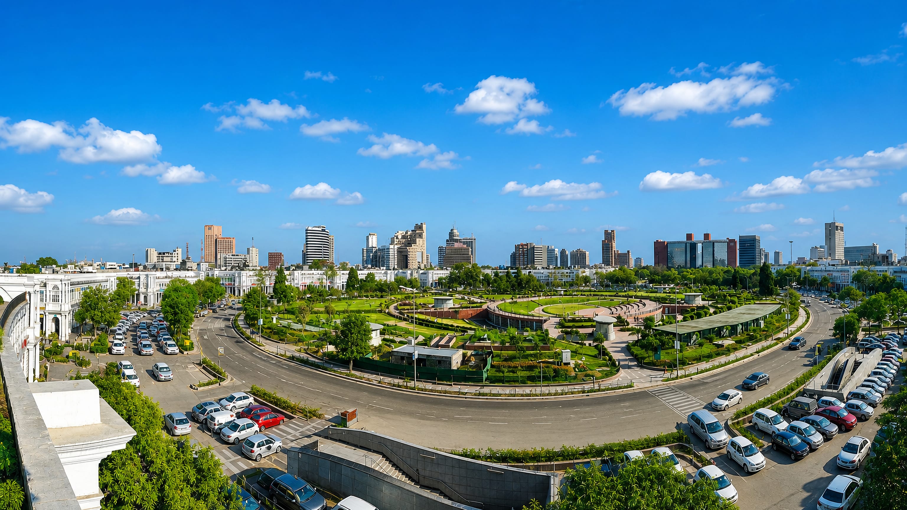 Connaught Place in New Delhi, its white colonnaded circle and Central Park ringed by traffic and city towers