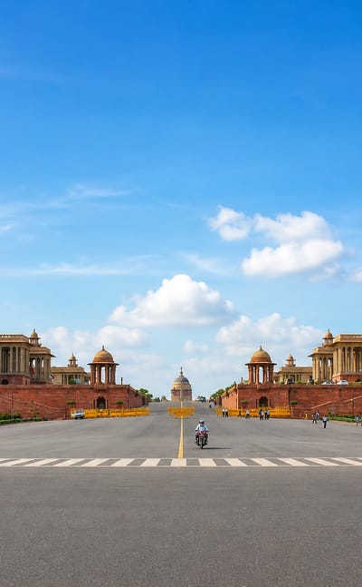 Rashtrapati Bhavan and the Secretariat buildings on Raisina Hill, New Delhi, flanking the broad Rajpath avenue