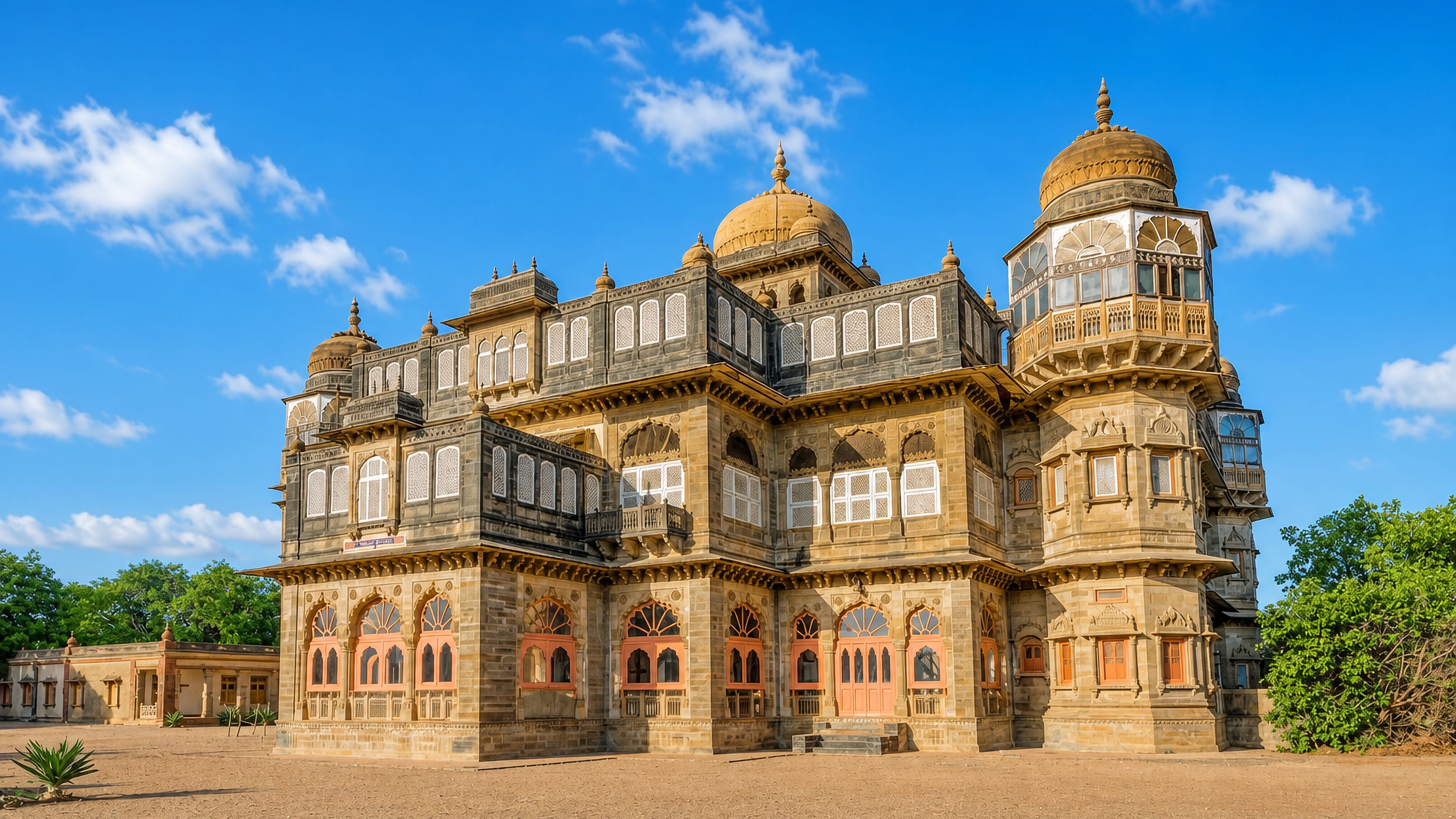 Vijay Vilas Palace, the domed royal residence at Māndvi in Kutch, seen across its sandy forecourt