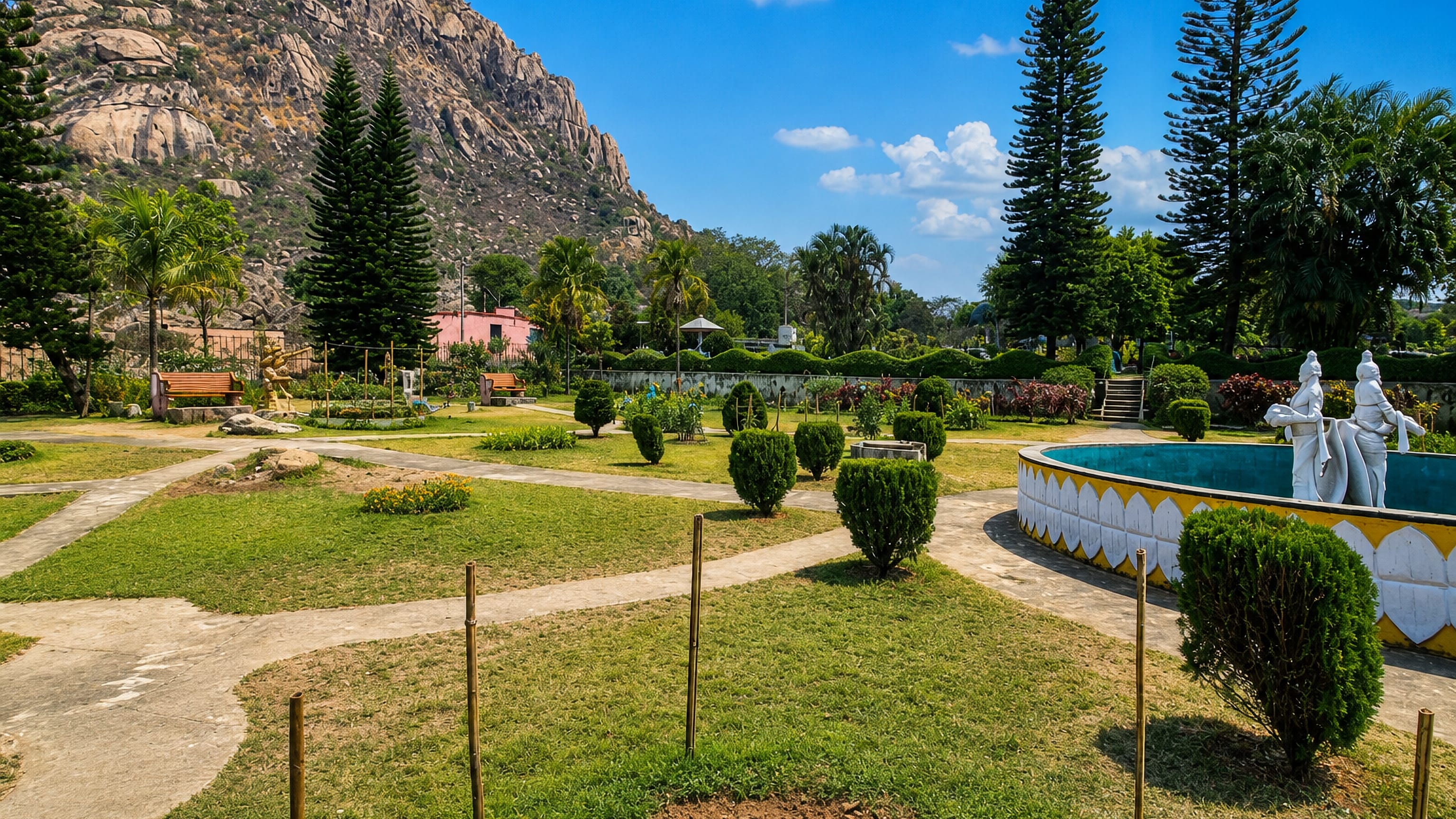 Landscaped public park with a fountain below a granite hill on the edge of Giridih, Jharkhand.