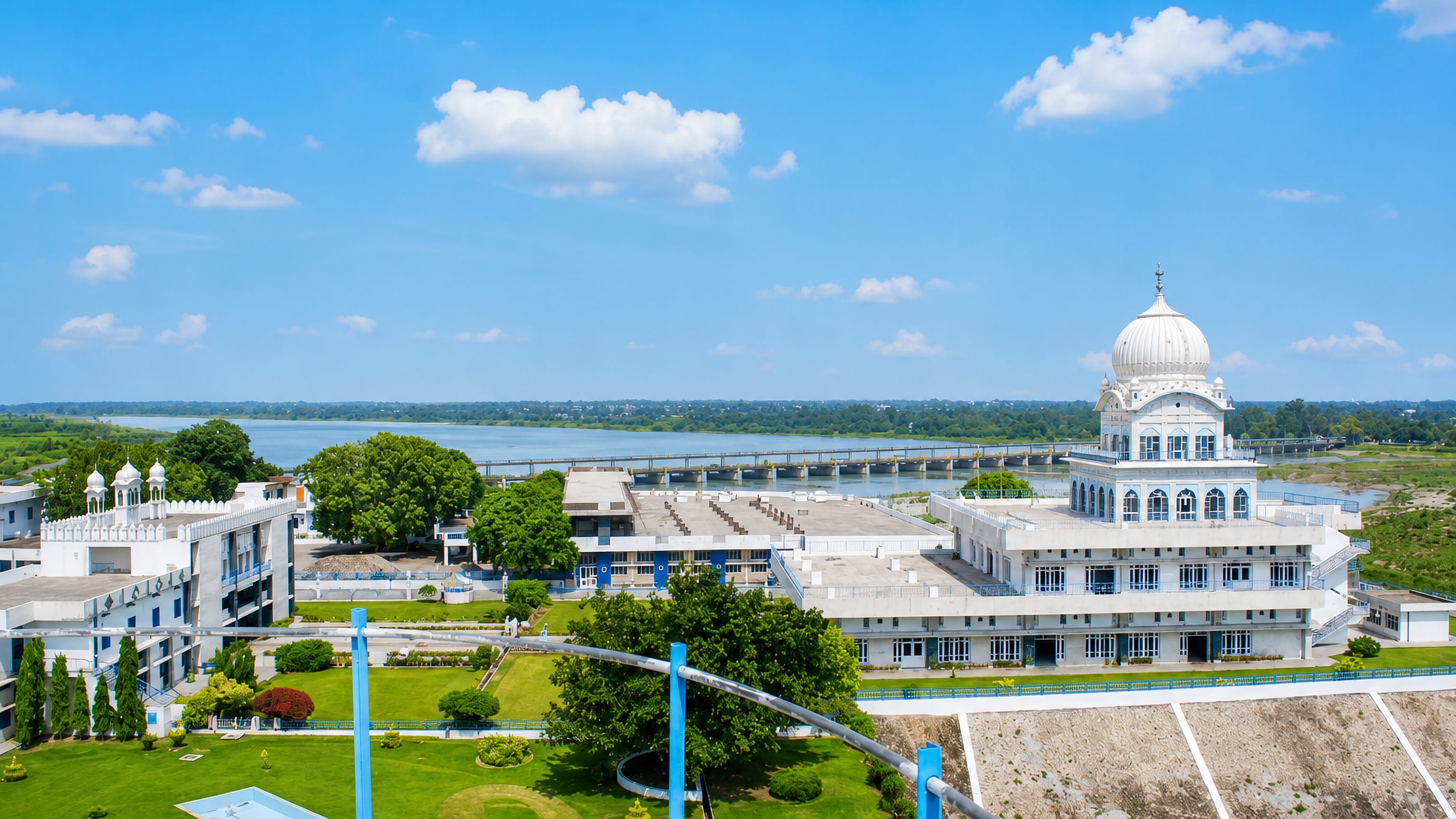 White-domed gurdwara beside the Sutlej river and its barrage at Ropar (Rupnagar), Punjab.