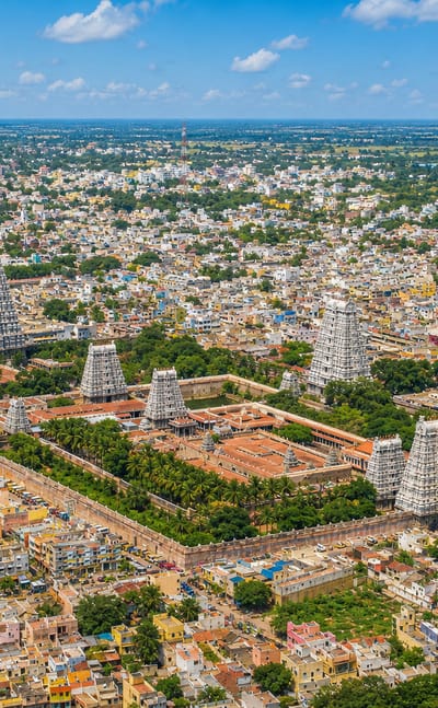 Aerial view of Tiruvannamalai with the Annamalaiyar Temple gopurams amid the town