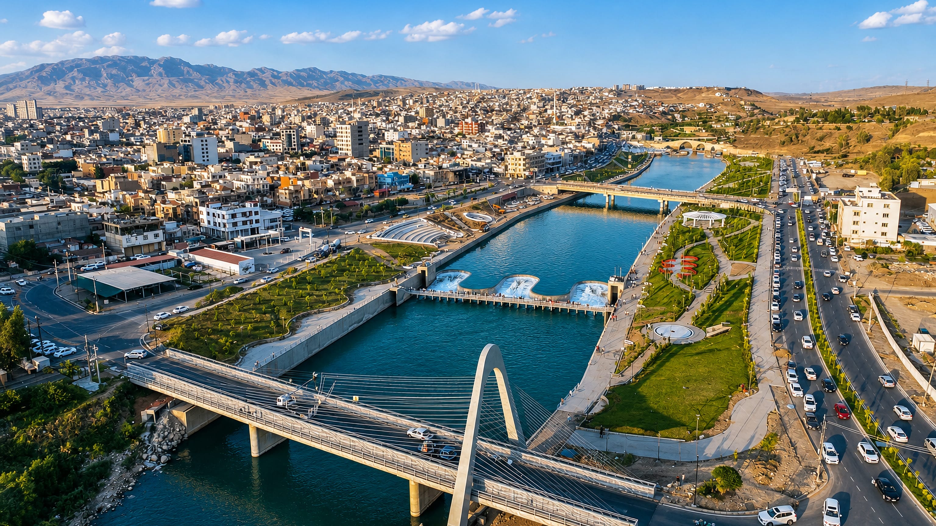 Zakho, Iraqi Kurdistan, seen from above with its cable-stayed bridge and riverside park on the Khabur.