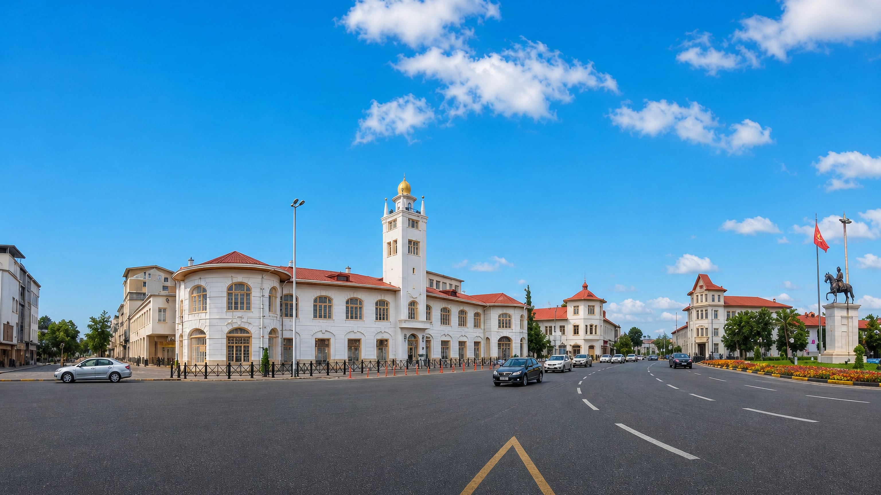 Rasht's white, red-roofed Municipality building and its tower on the main square in Gilan, Iran.