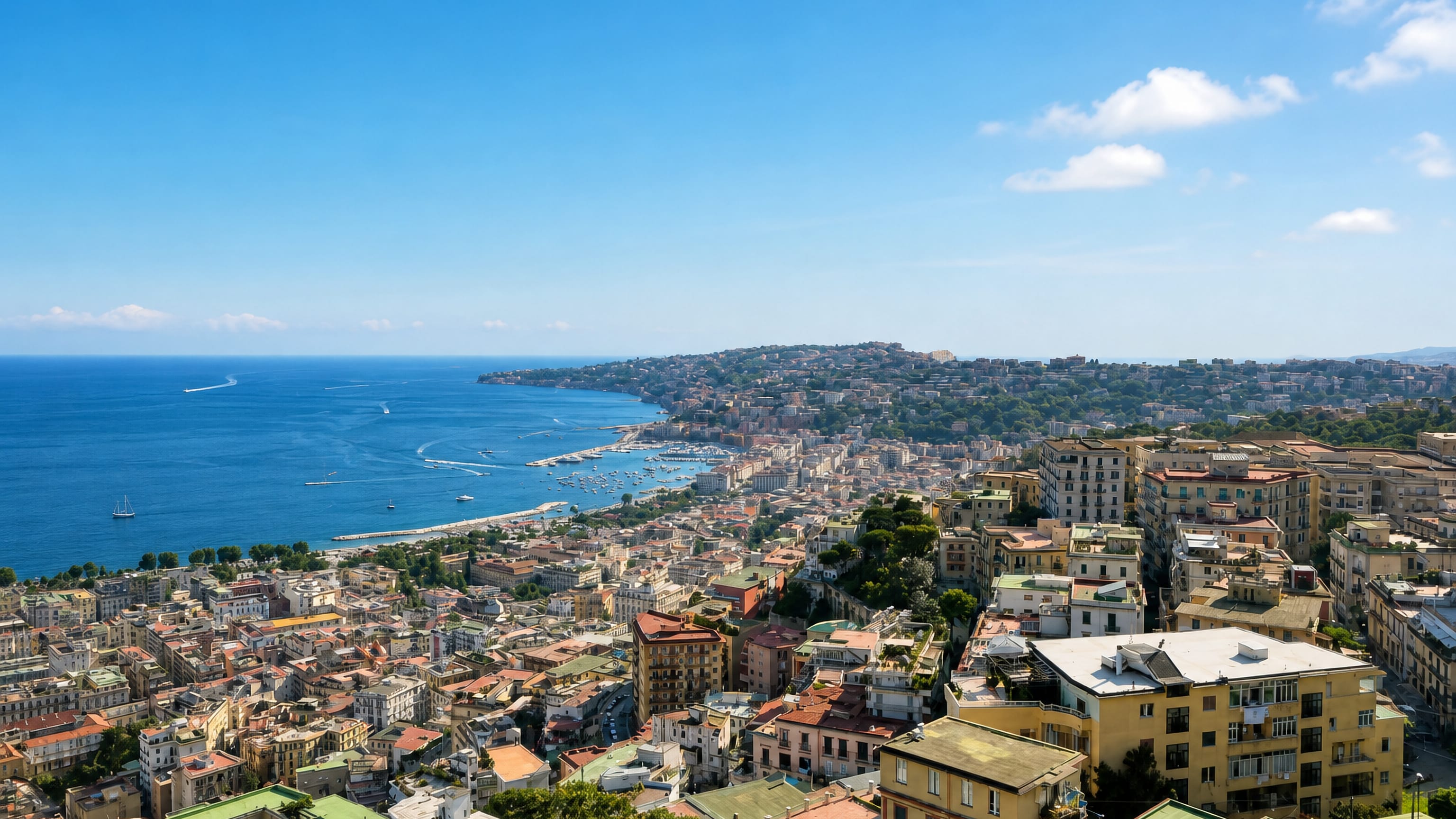 Chiaia rooftops sloping to the Gulf of Naples with Mergellina harbour and the Posillipo headland