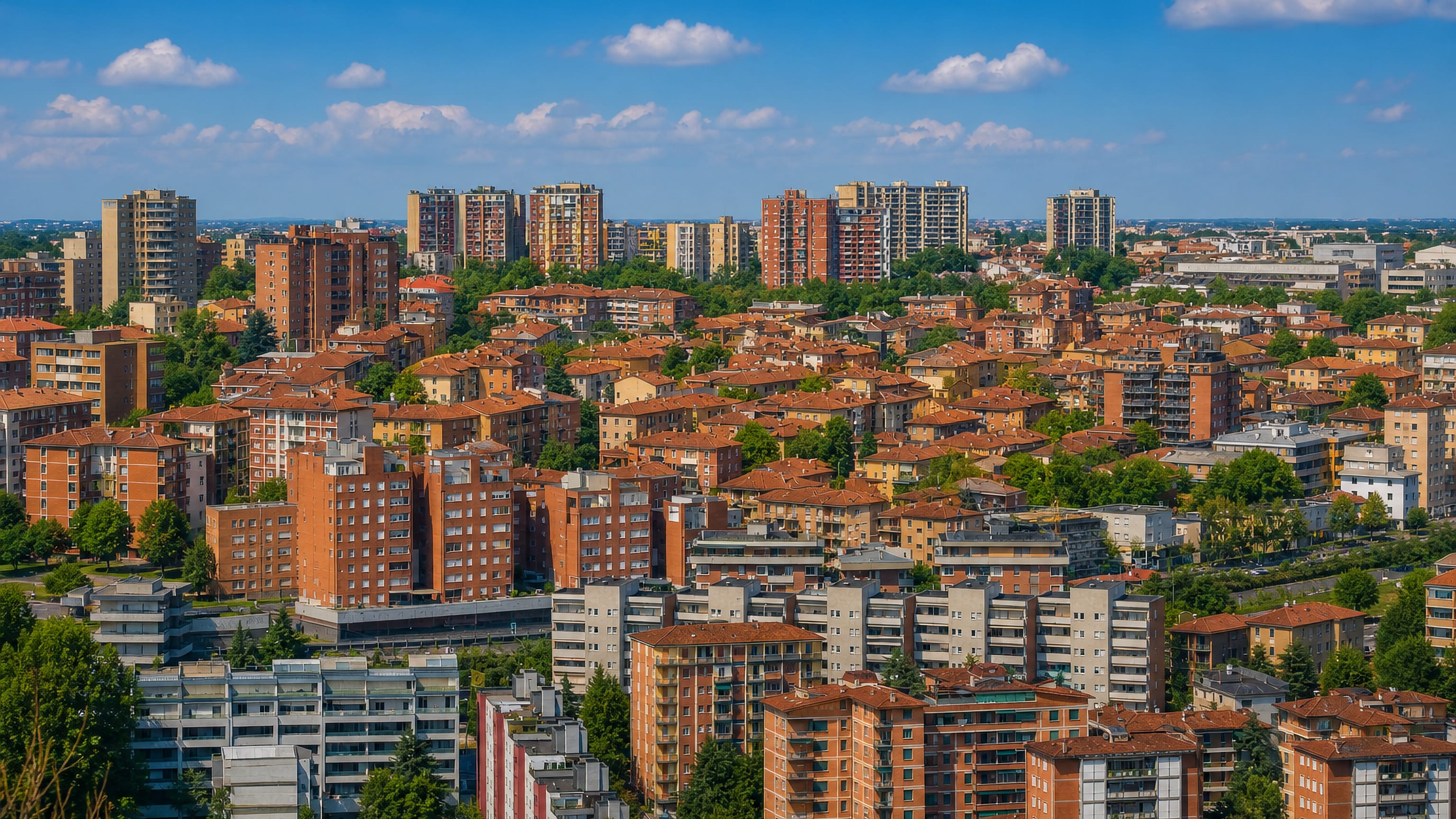 Terracotta rooftops and postwar towers across the Borgo Panigale-Reno district on the edge of Bologna, Italy