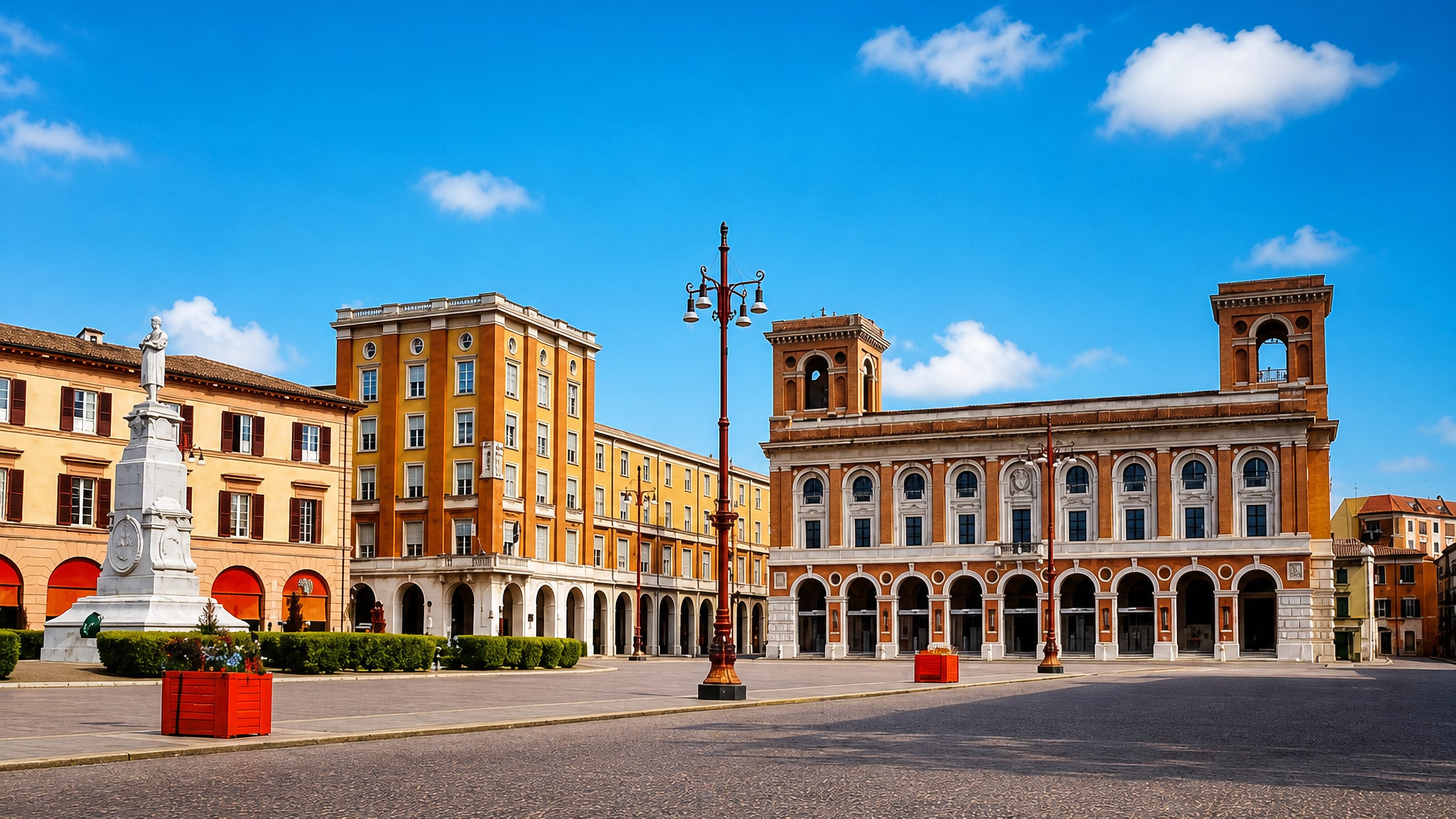 Piazza Aurelio Saffi in Forli with the arcaded Palazzo delle Poste and the white Saffi monument.